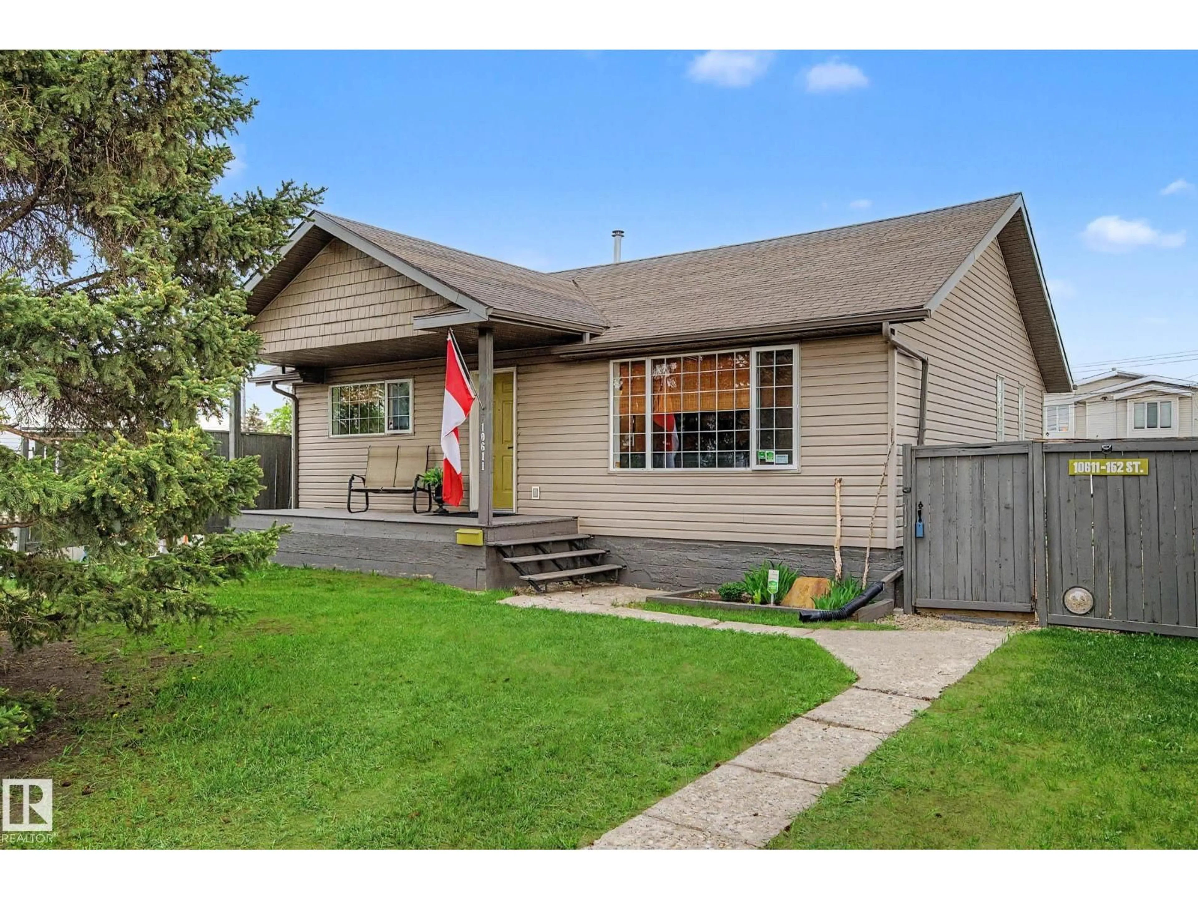 Home with vinyl exterior material, street for NW - 10611 152 ST, Edmonton Alberta T5P1Z1