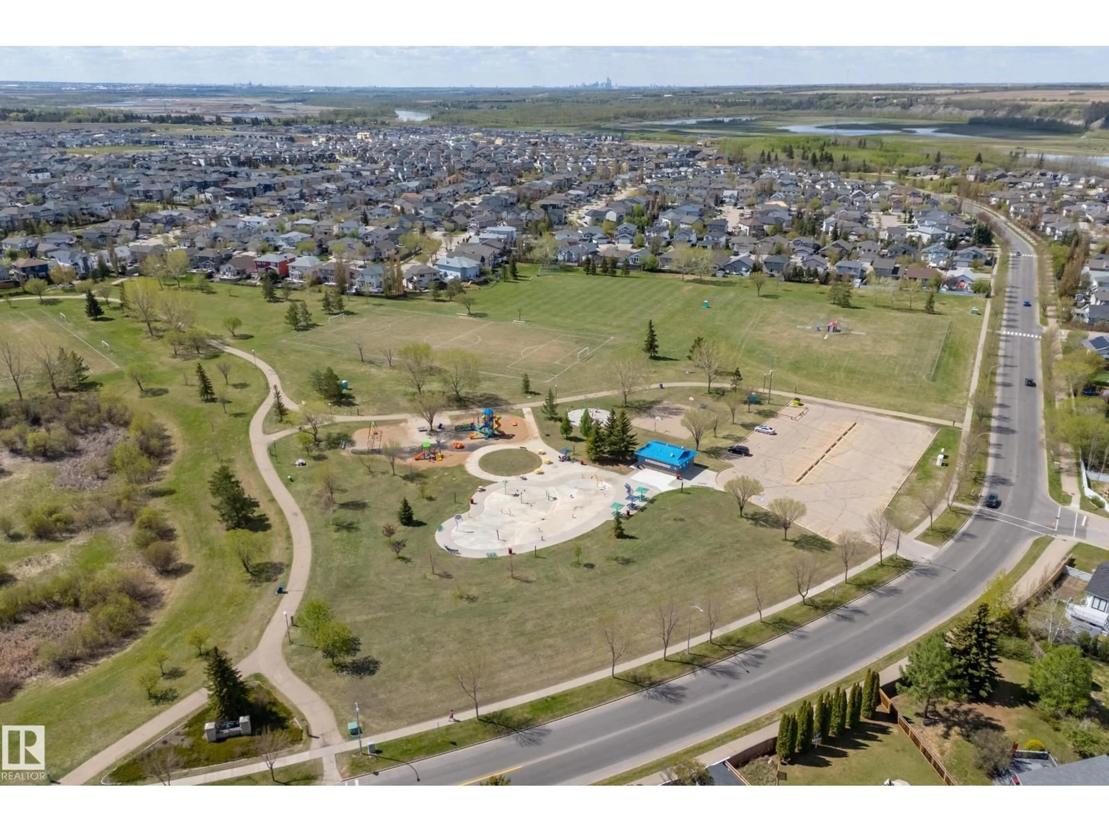 A pic from outside/outdoor area/front of a property/back of a property/a pic from drone, water/lake/river/ocean view for 15 WESTWOOD GR, Fort Saskatchewan Alberta T8L4G3