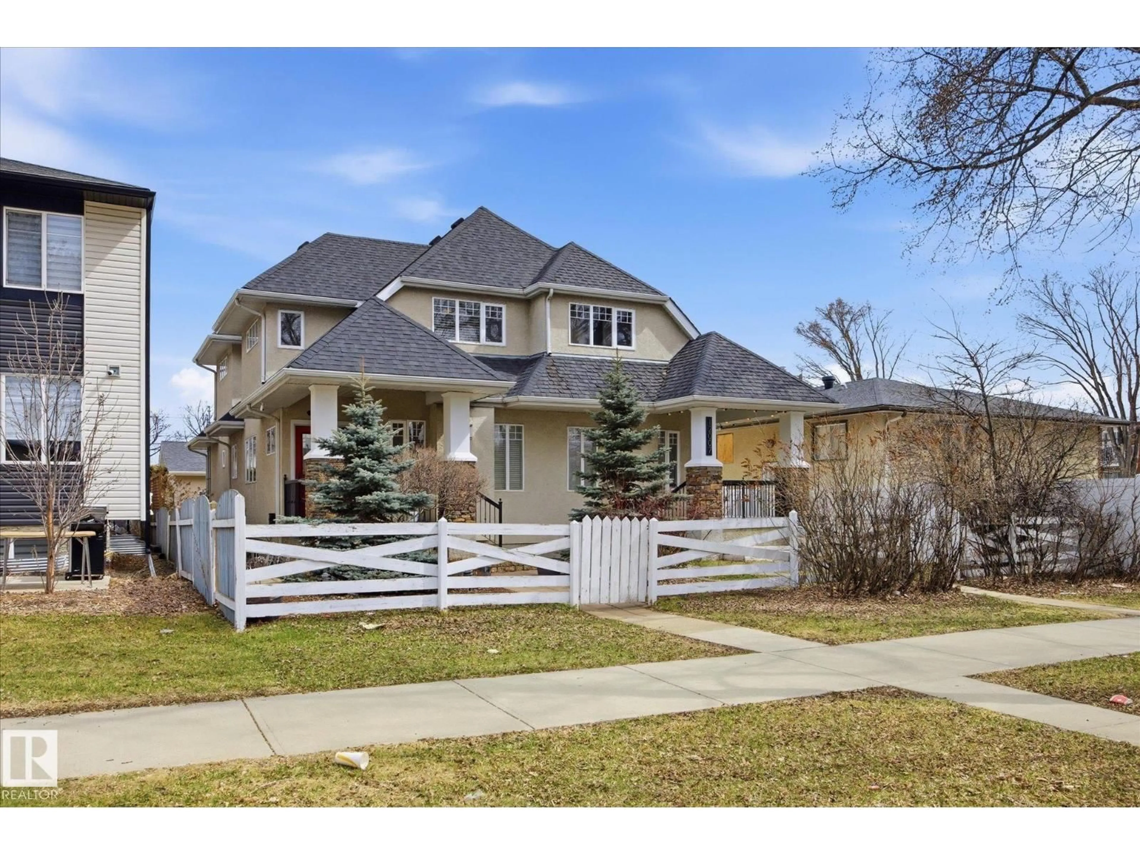 Home with brick exterior material, street for 12009 102 ST, Edmonton Alberta T5G2G6