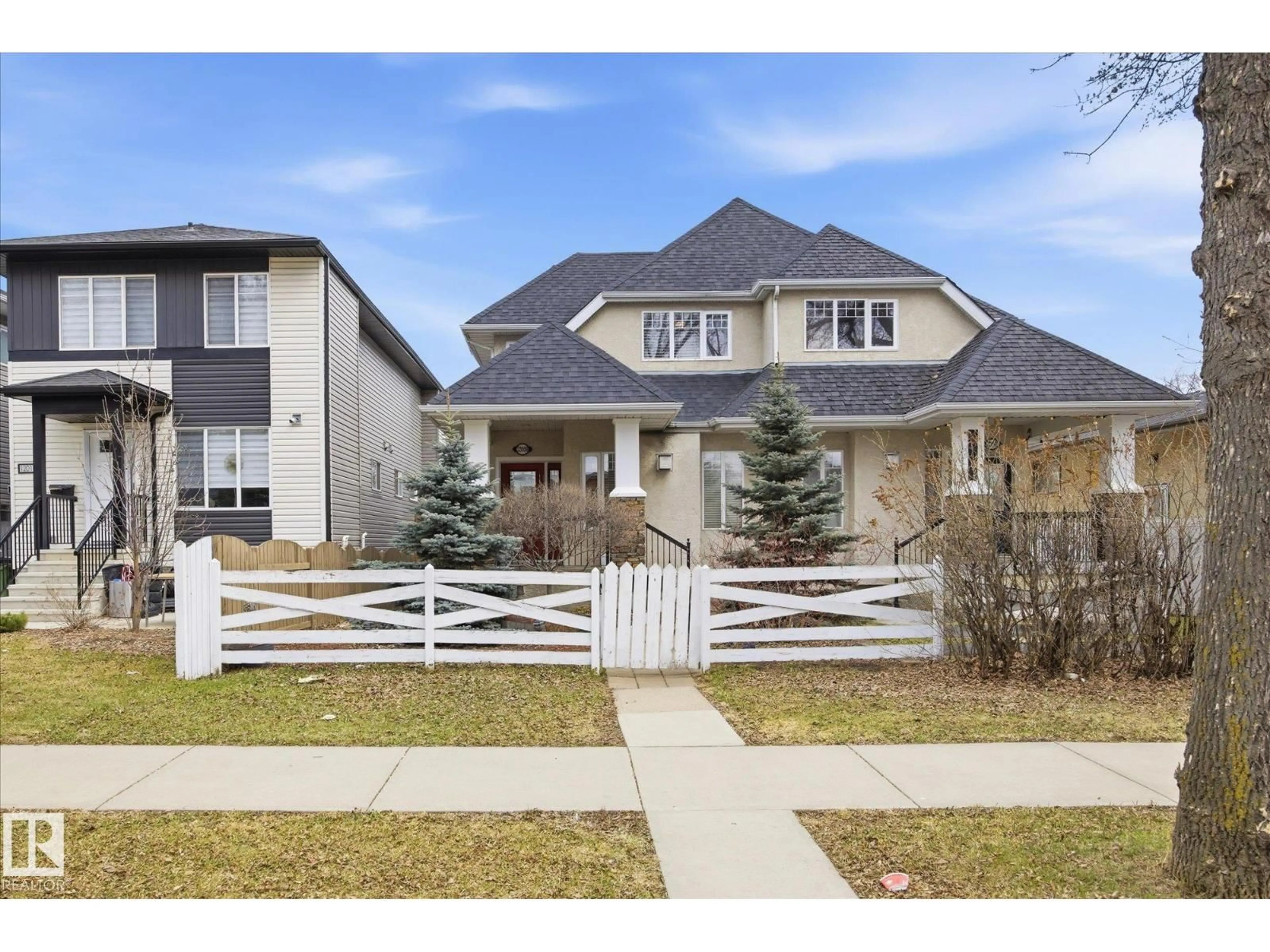 Home with brick exterior material, street for 12009 102 ST, Edmonton Alberta T5G2G6