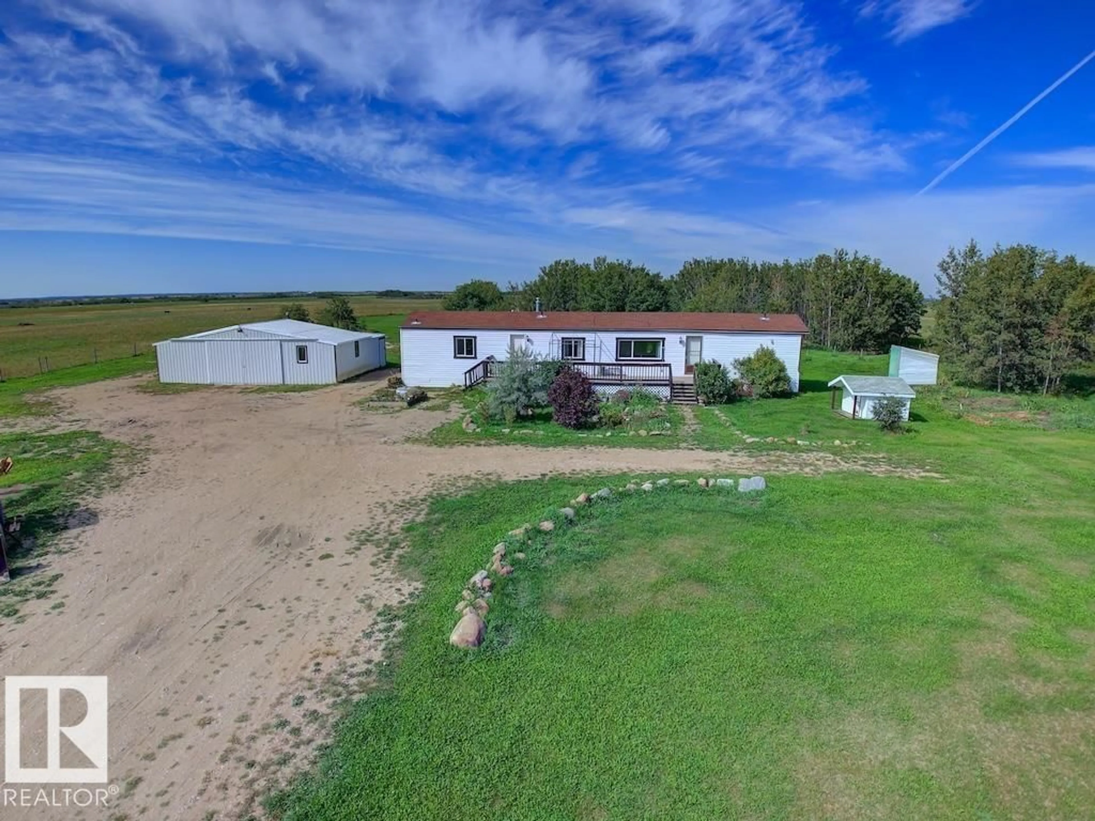 A pic from outside/outdoor area/front of a property/back of a property/a pic from drone, water/lake/river/ocean view for 534034 RR 182, Rural Lamont County Alberta T0B0W0