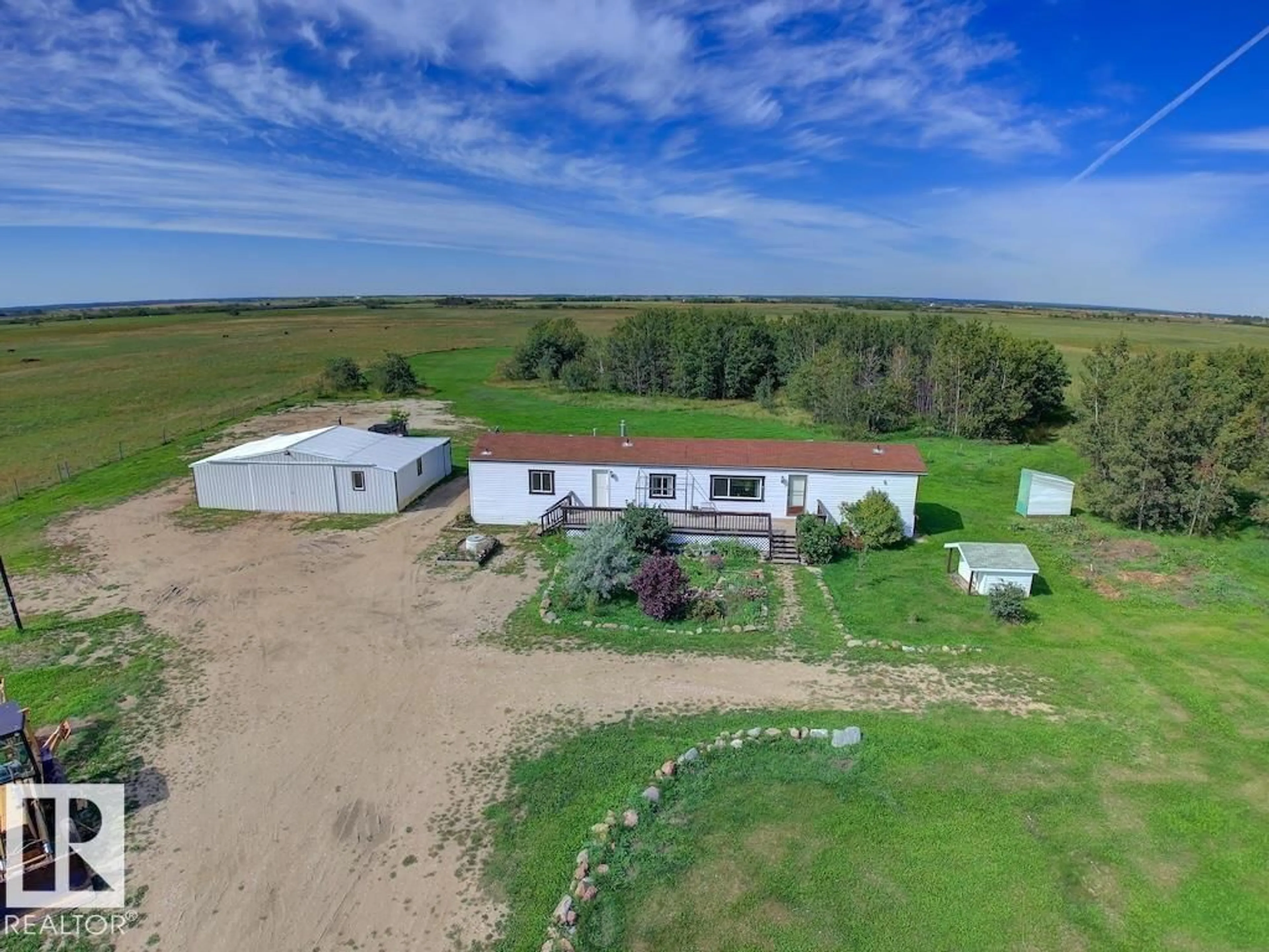 A pic from outside/outdoor area/front of a property/back of a property/a pic from drone, building for 534034 RR 182, Rural Lamont County Alberta T0B0W0