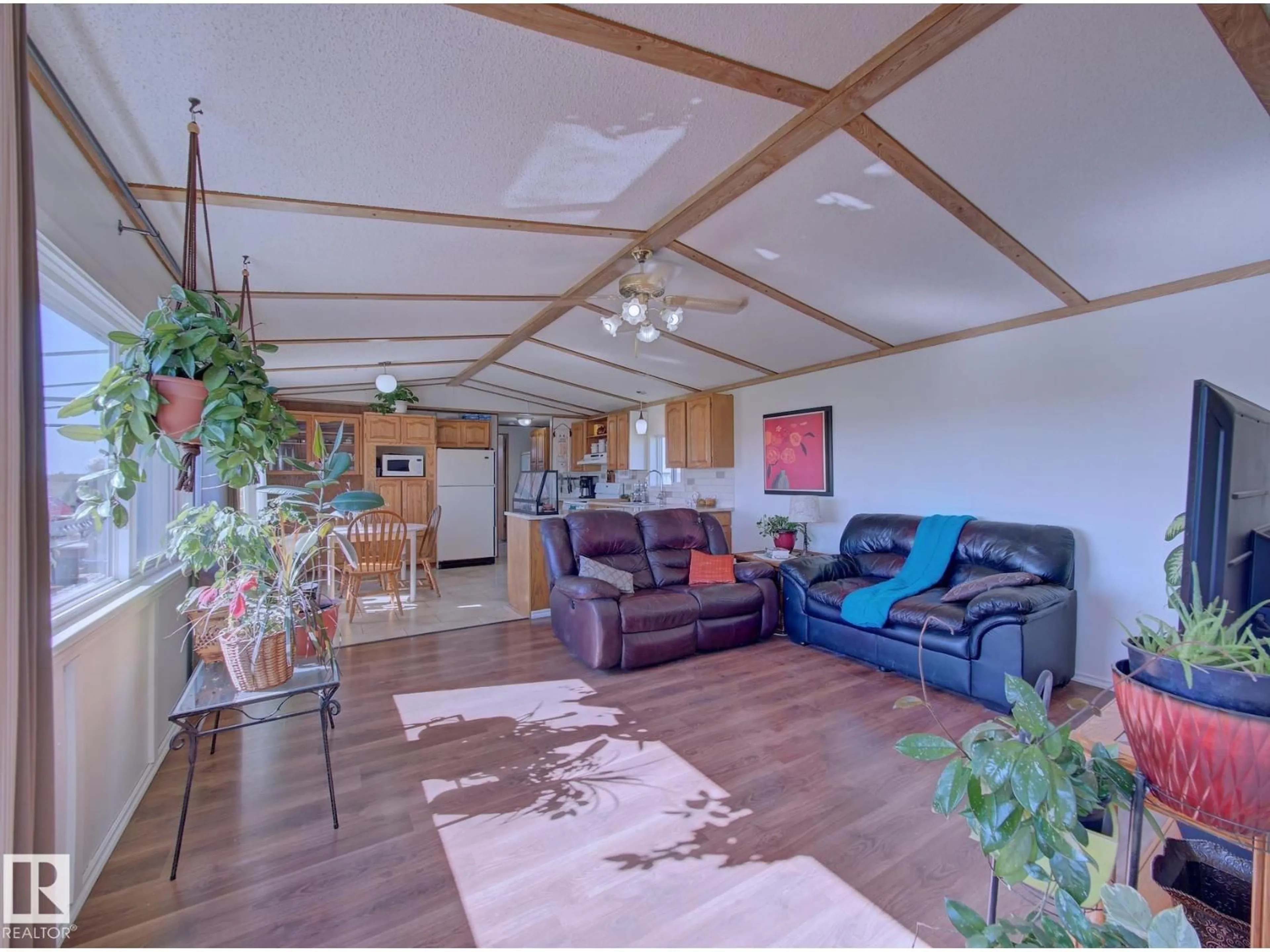 Living room with furniture, wood/laminate floor for 534034 RR 182, Rural Lamont County Alberta T0B0W0