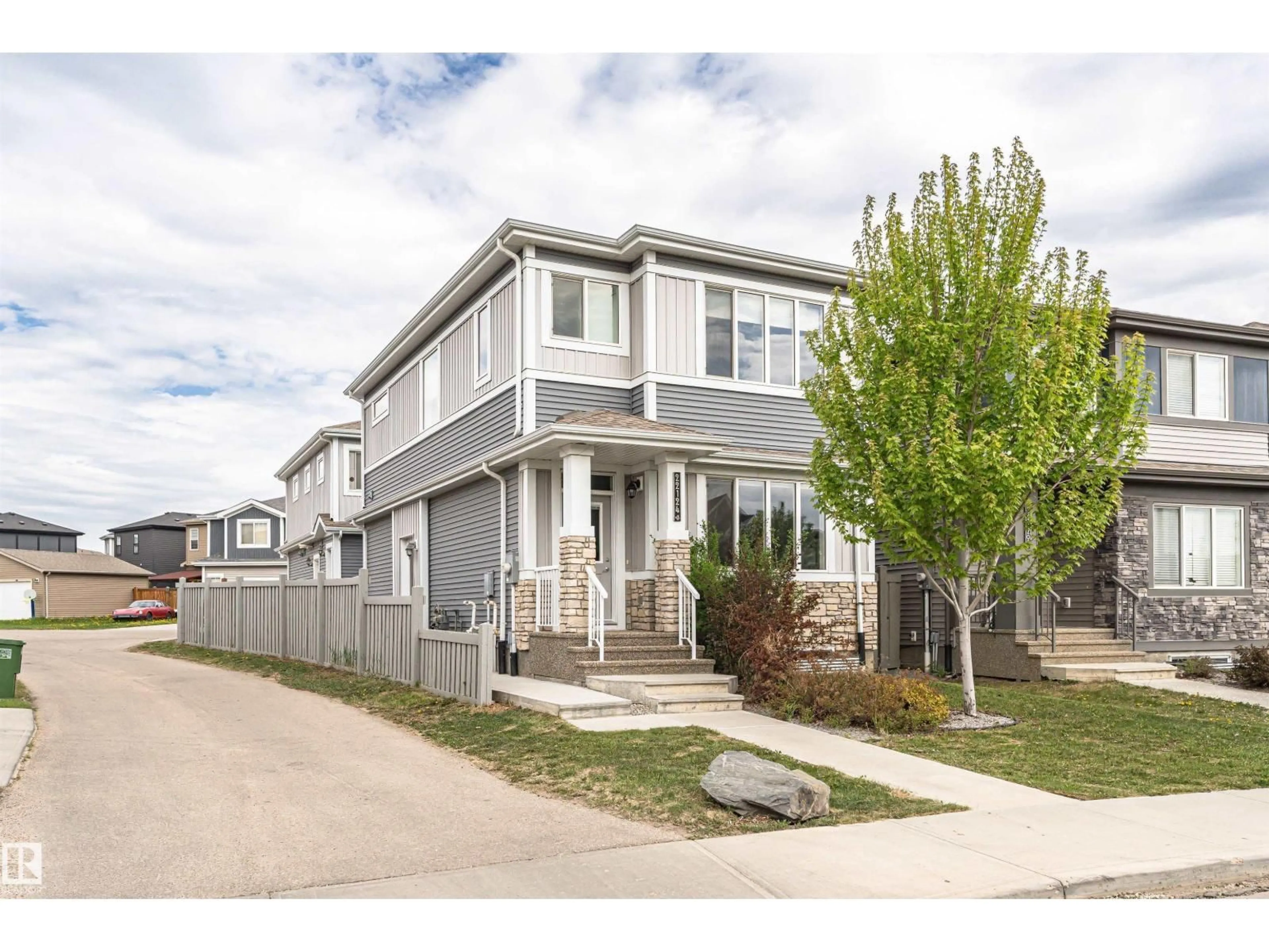 Home with vinyl exterior material, street for NW - 22124 85 AV, Edmonton Alberta T5T7E4