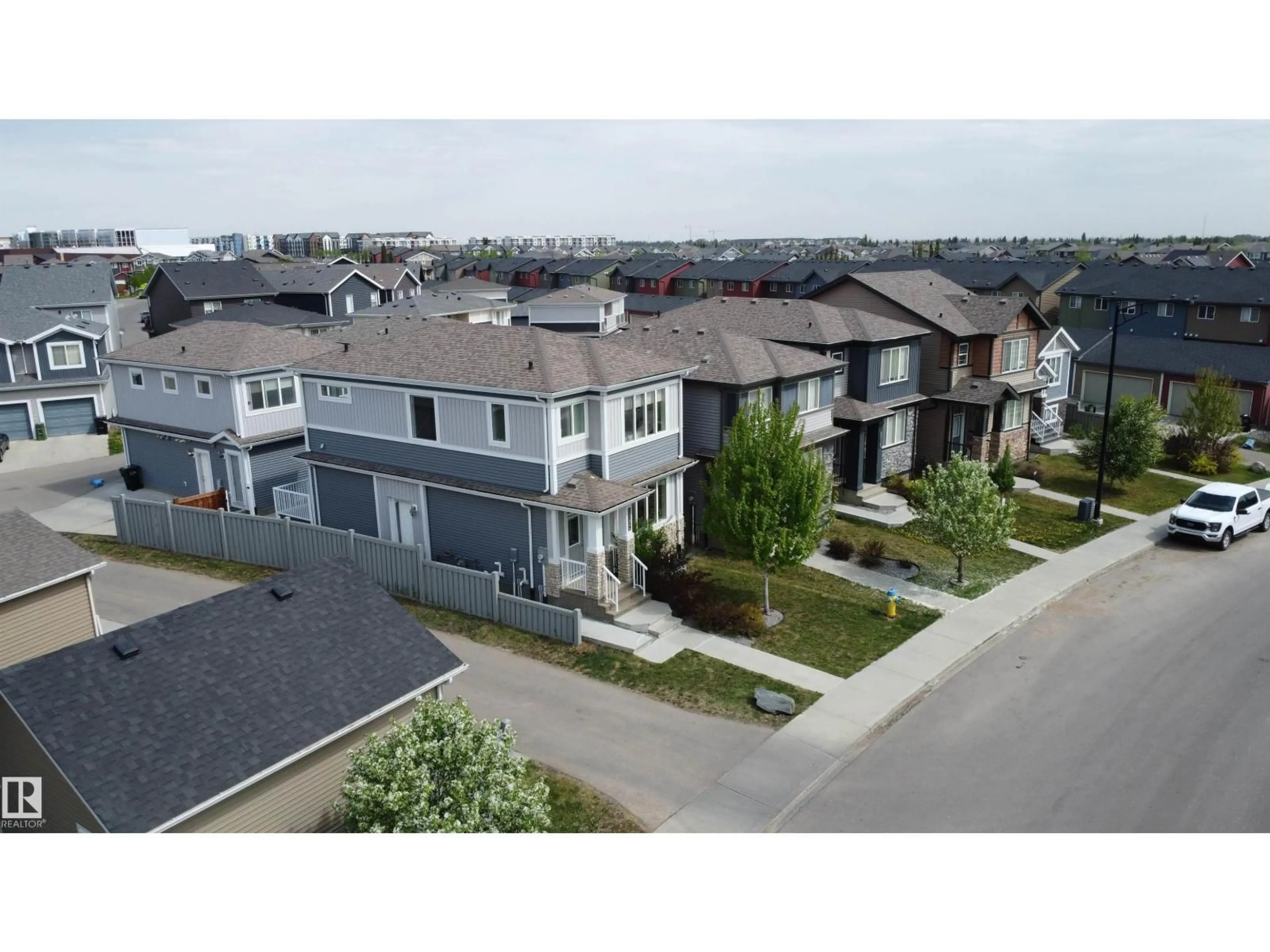 A pic from outside/outdoor area/front of a property/back of a property/a pic from drone, street for NW - 22124 85 AV, Edmonton Alberta T5T7E4