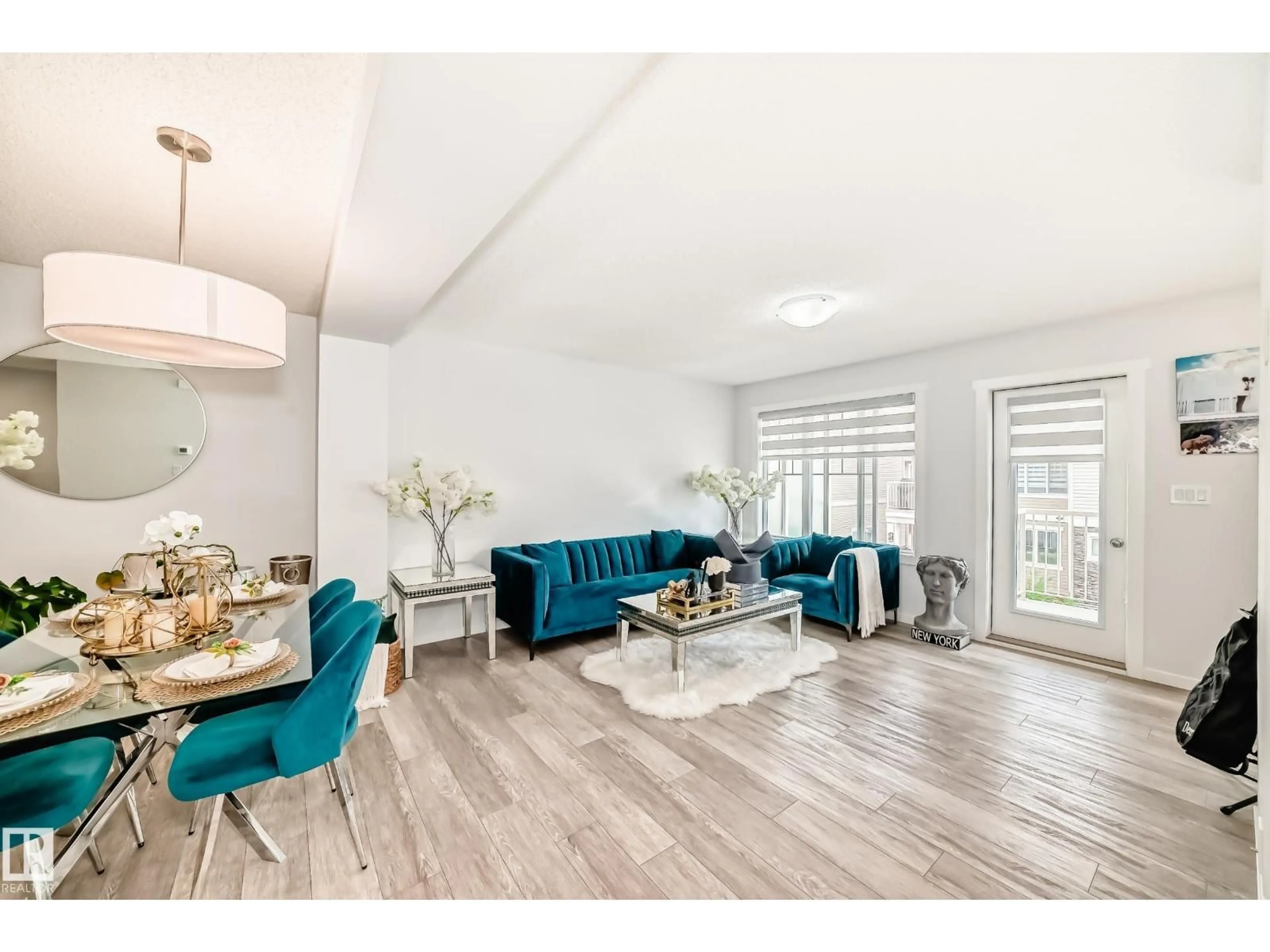 Living room with furniture, wood/laminate floor for 67 17832 78 ST NW, Edmonton Alberta T5Z0P7