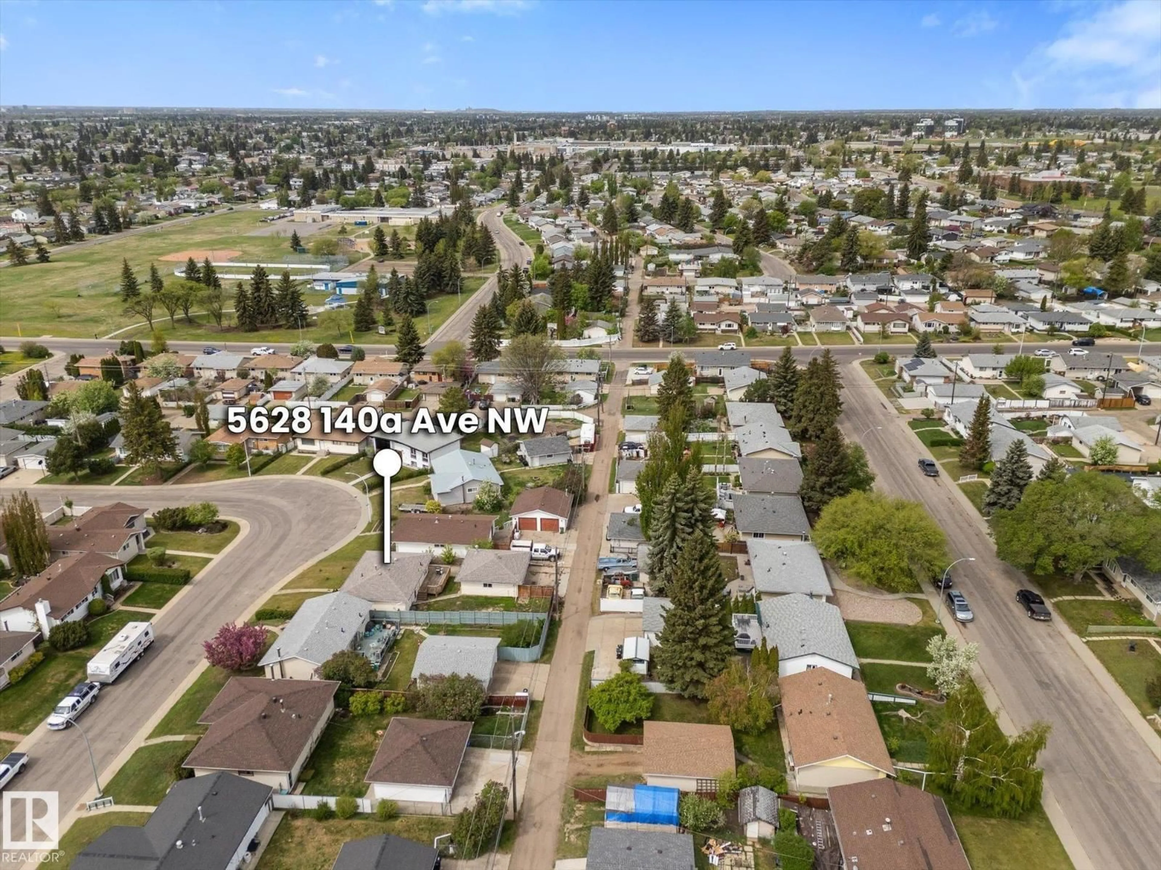 A pic from outside/outdoor area/front of a property/back of a property/a pic from drone, street for 5628 140A AV, Edmonton Alberta T5A1H3