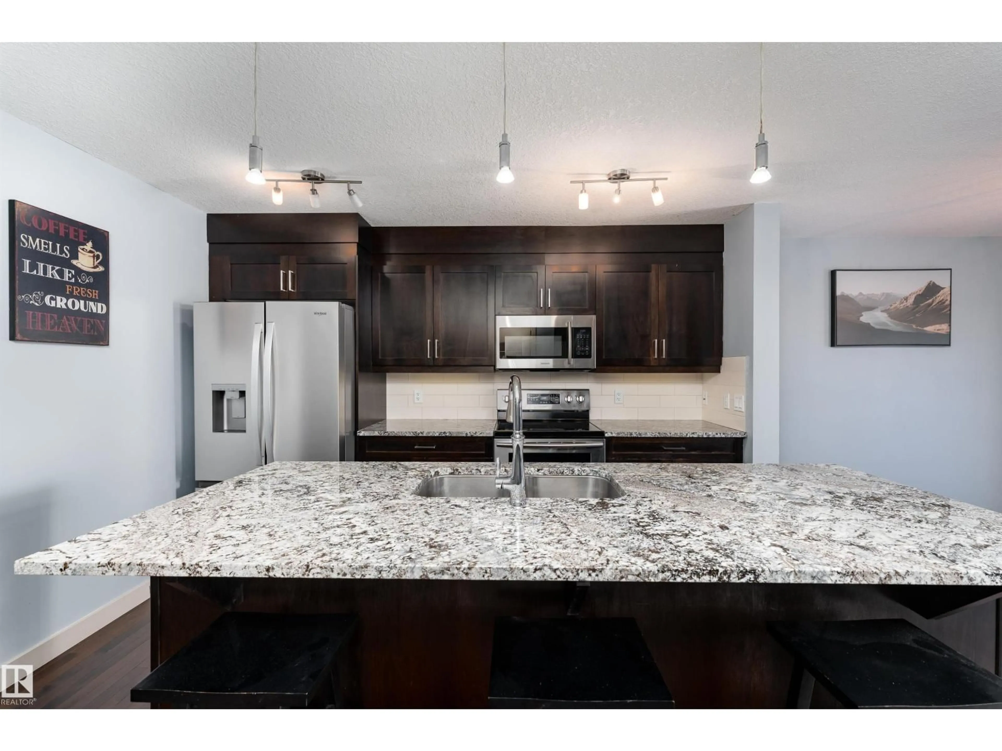 Open concept kitchen, ceramic/tile floor for 152 RADCLIFFE WD, Fort Saskatchewan Alberta T8L0S9