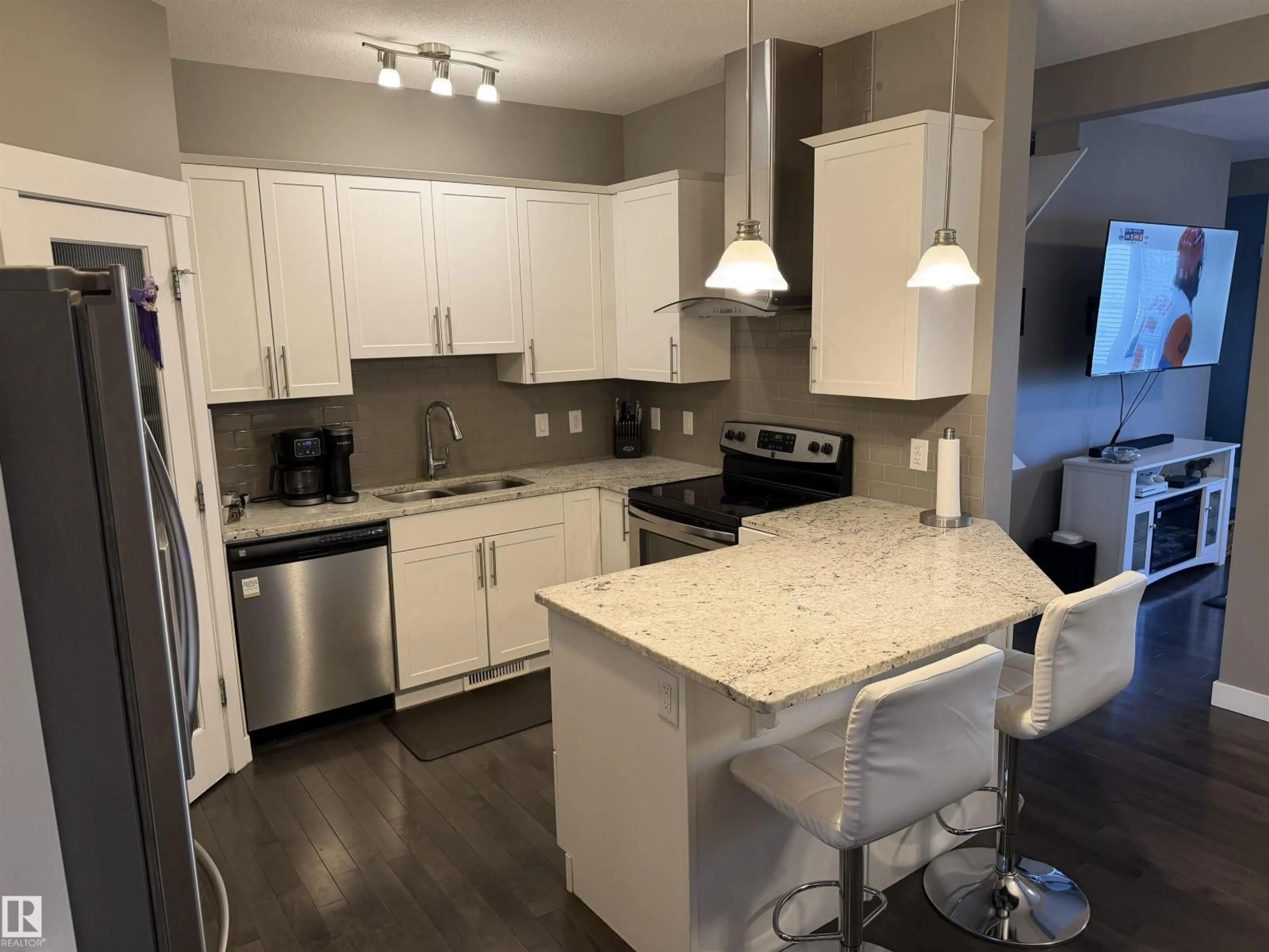 Open concept kitchen, unknown for 7028 174 AV, Edmonton Alberta T5Z0L3