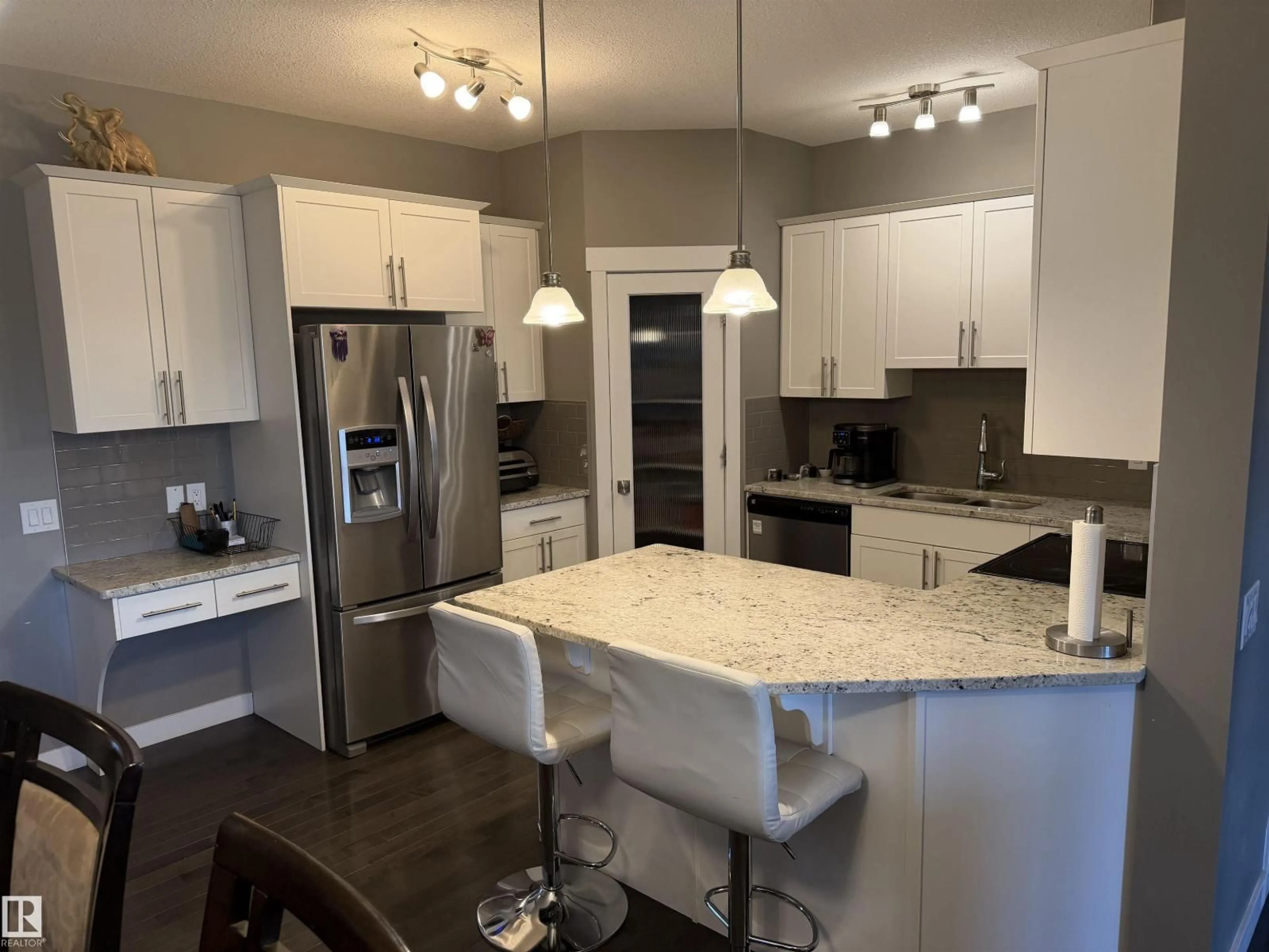 Open concept kitchen, unknown for 7028 174 AV, Edmonton Alberta T5Z0L3