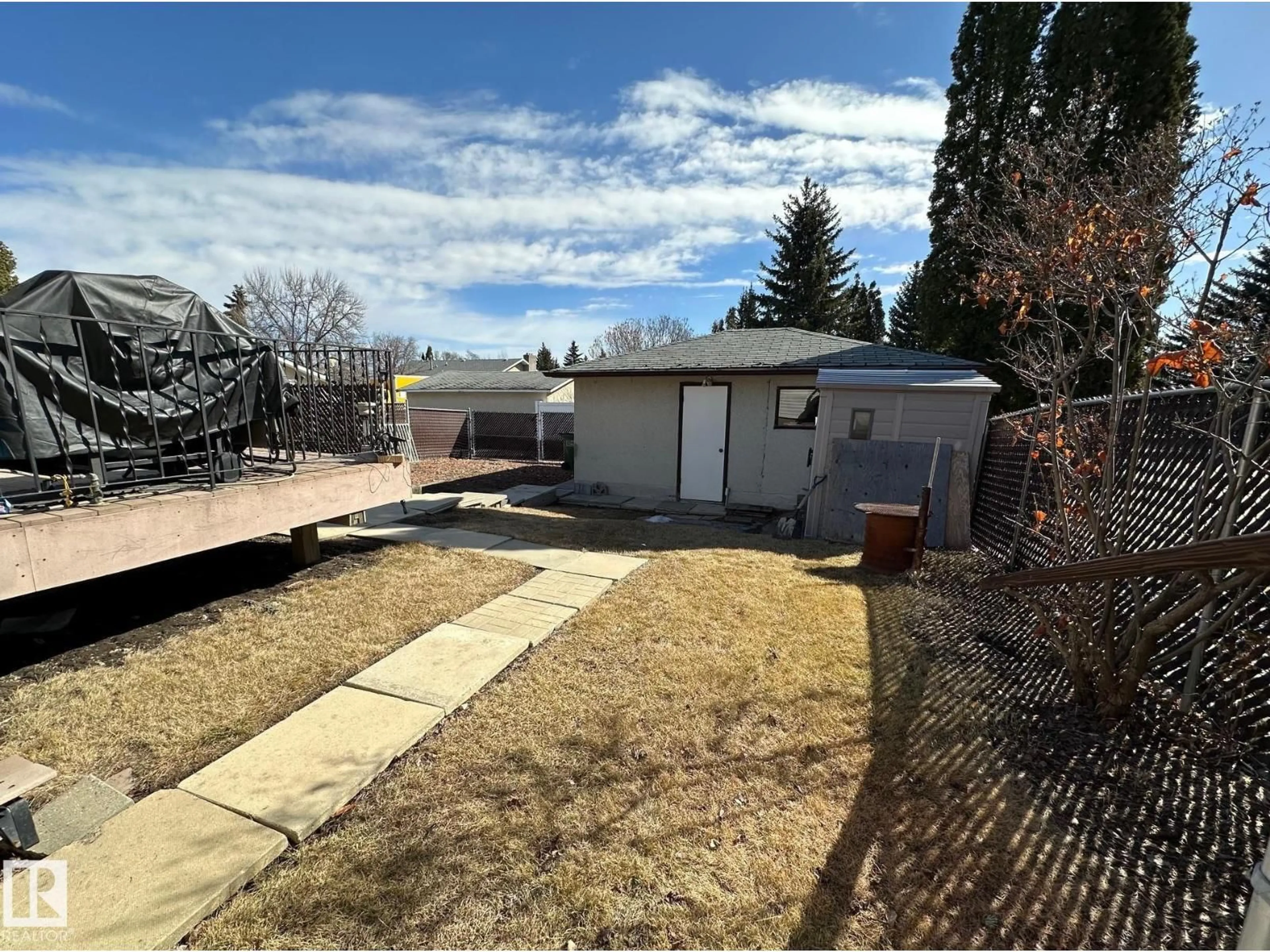 A pic from outside/outdoor area/front of a property/back of a property/a pic from drone, mountain view for 7916 150 AV, Edmonton Alberta T5C2Y4