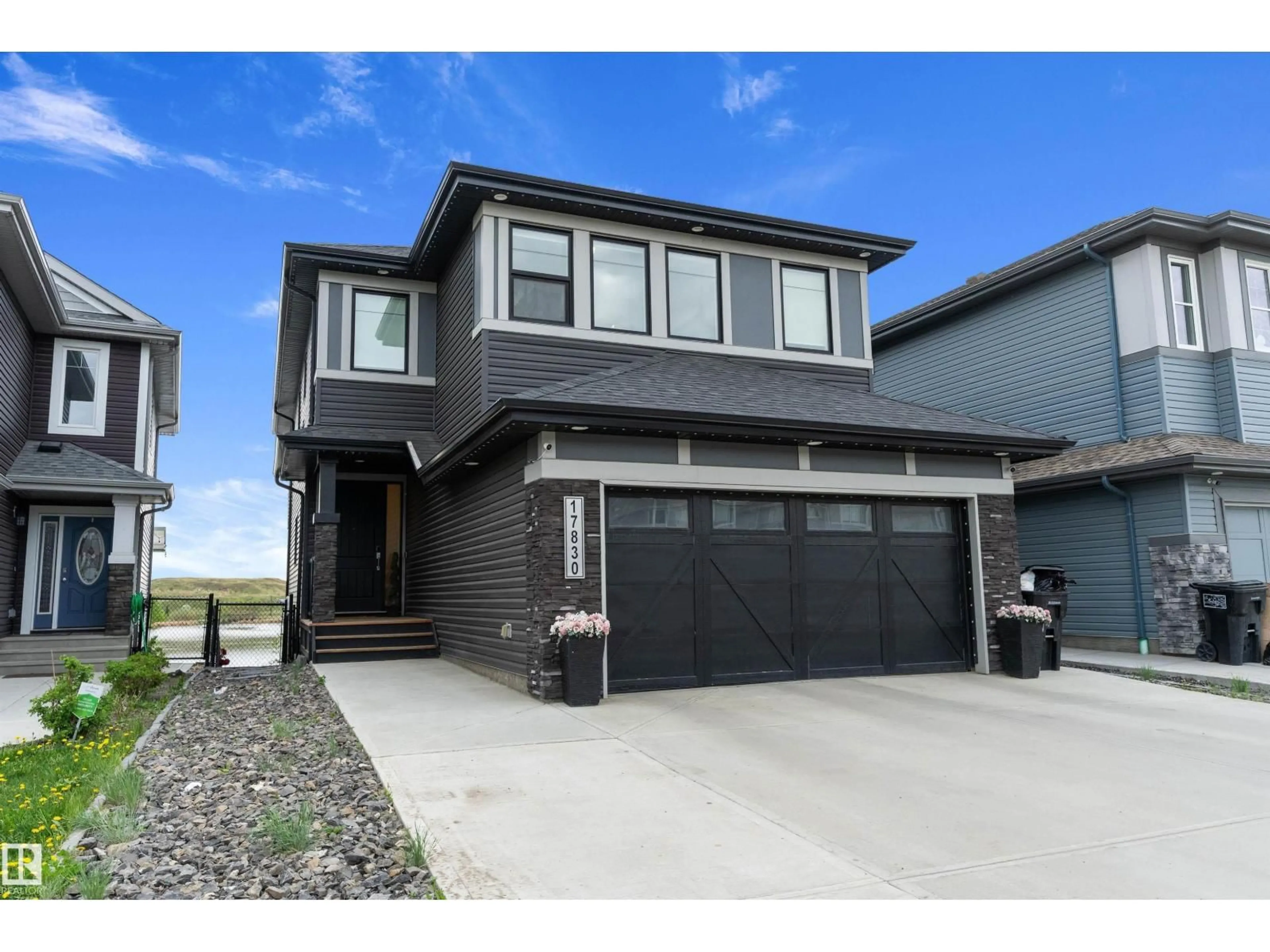 Home with vinyl exterior material, street for NW - 17830 62A ST, Edmonton Alberta T5Y3R3