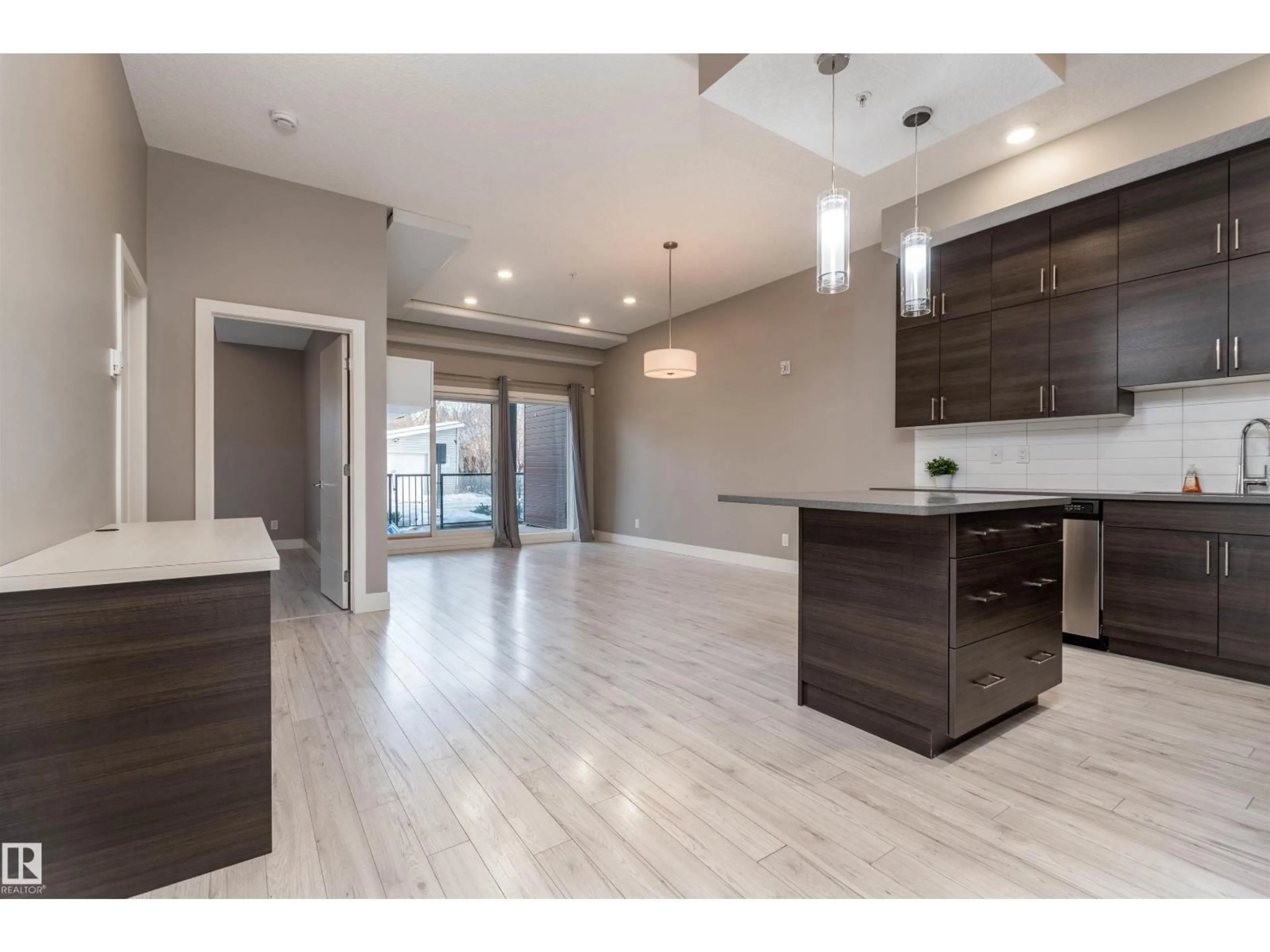 Open concept kitchen, unknown for #105 - 10006 83 AV, Edmonton Alberta T6E2C2