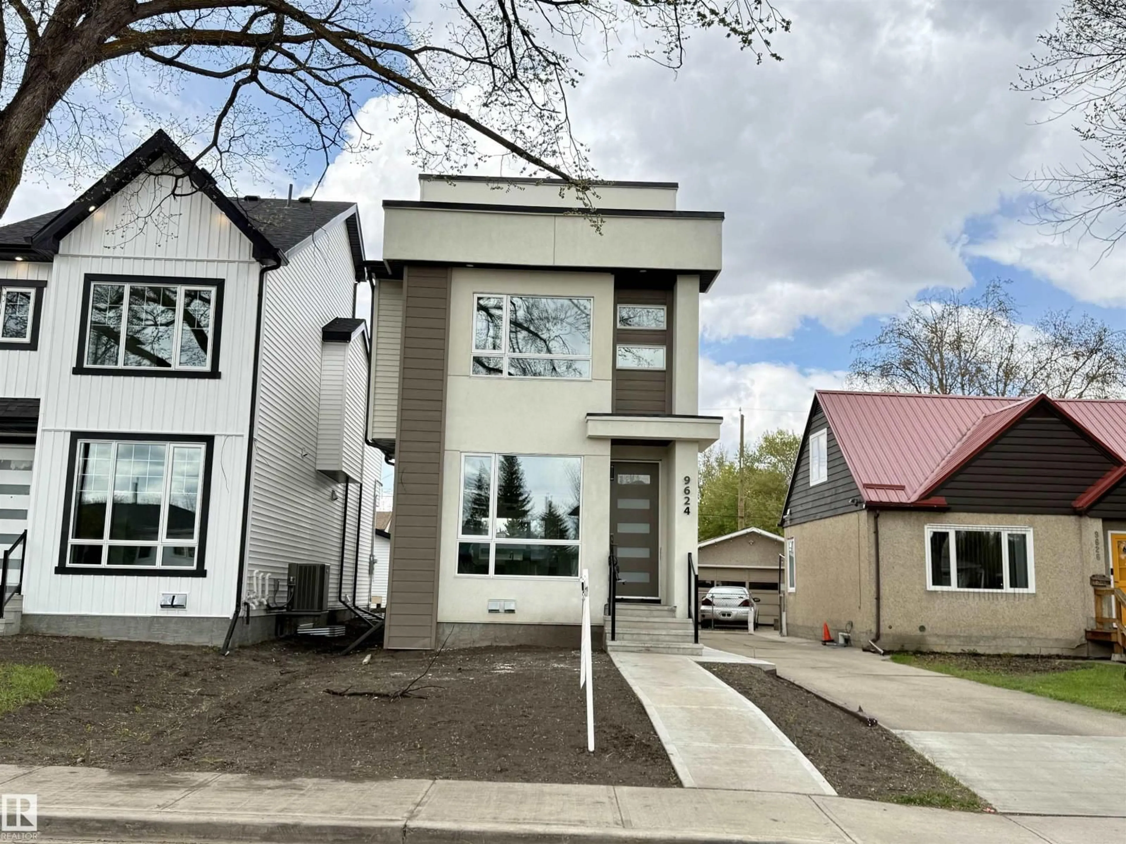 Home with vinyl exterior material, street for 9624 86 ST, Edmonton Alberta T6C3E9
