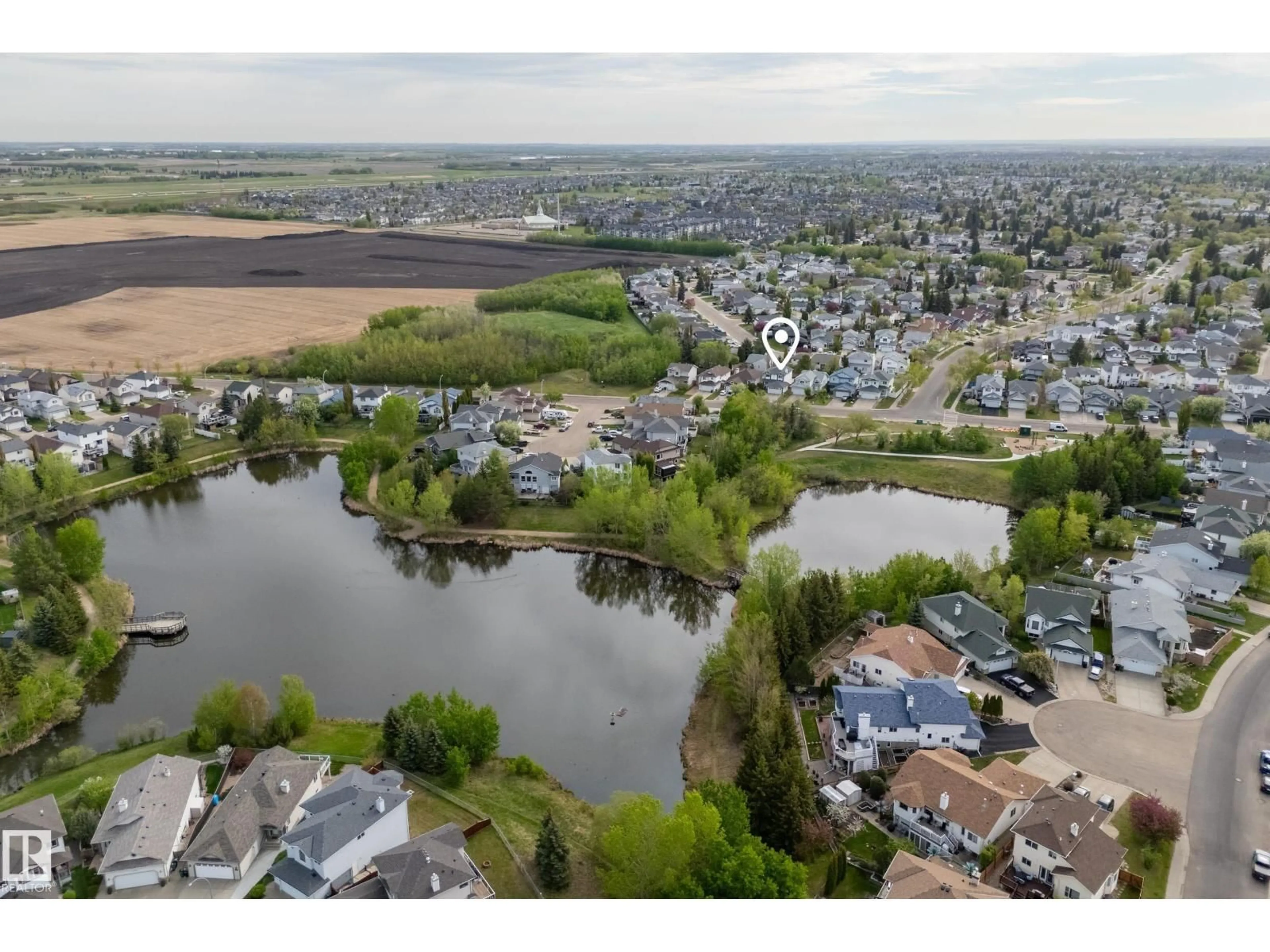 A pic from outside/outdoor area/front of a property/back of a property/a pic from drone, water/lake/river/ocean view for 17205 115 ST, Edmonton Alberta T5X5Y1