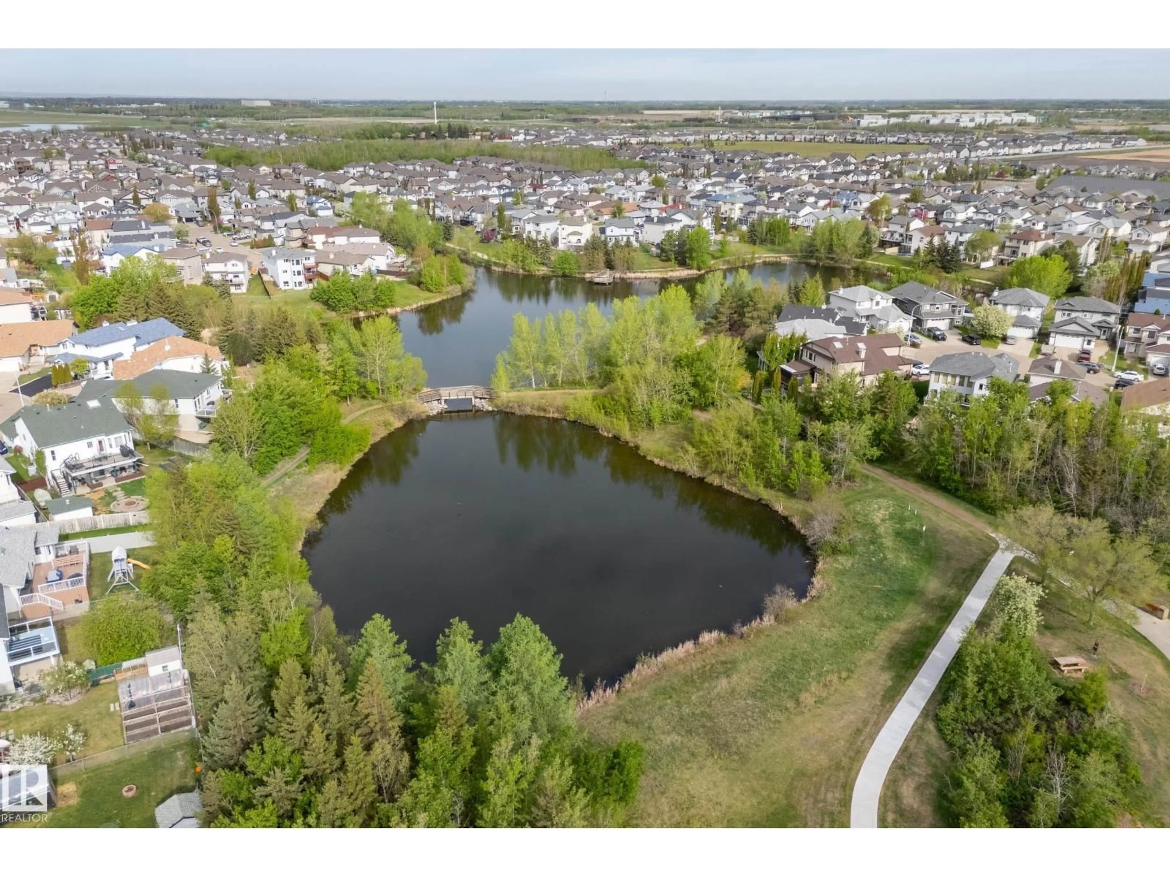 A pic from outside/outdoor area/front of a property/back of a property/a pic from drone, water/lake/river/ocean view for 17205 115 ST, Edmonton Alberta T5X5Y1