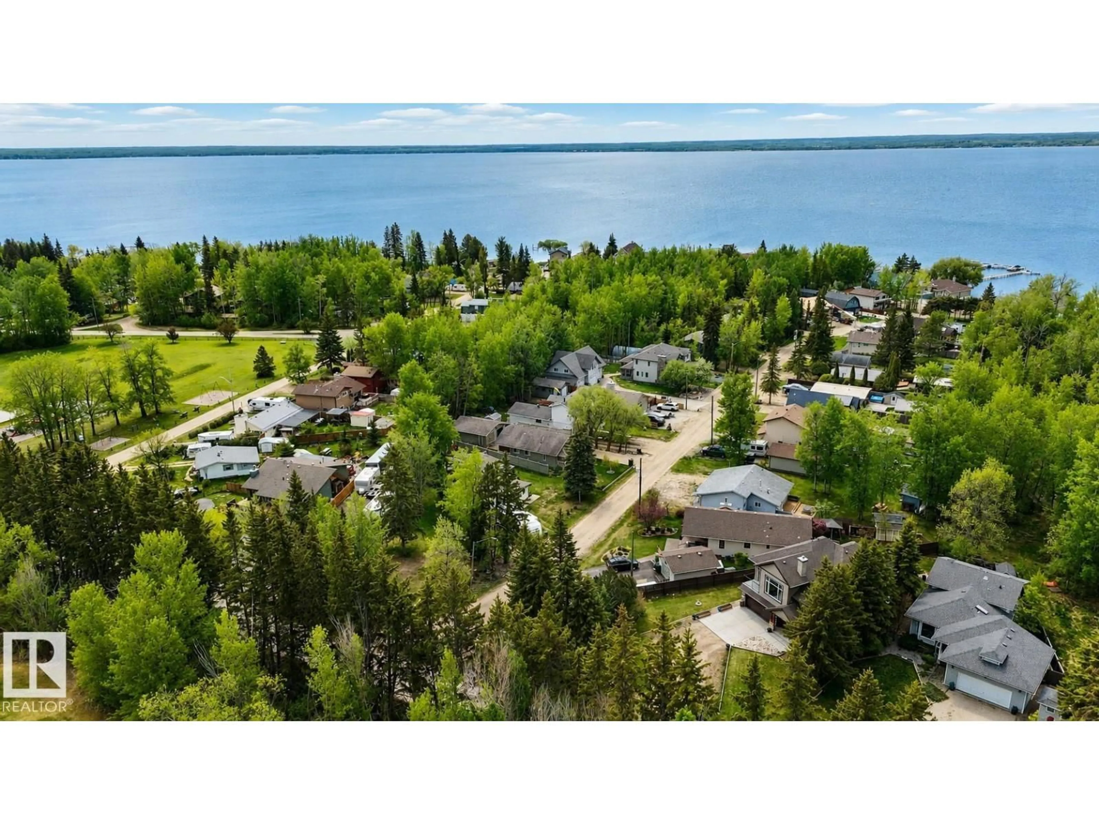 A pic from outside/outdoor area/front of a property/back of a property/a pic from drone, water/lake/river/ocean view for 977 9TH ST, Rural Lac Ste. Anne County Alberta T0E1A0