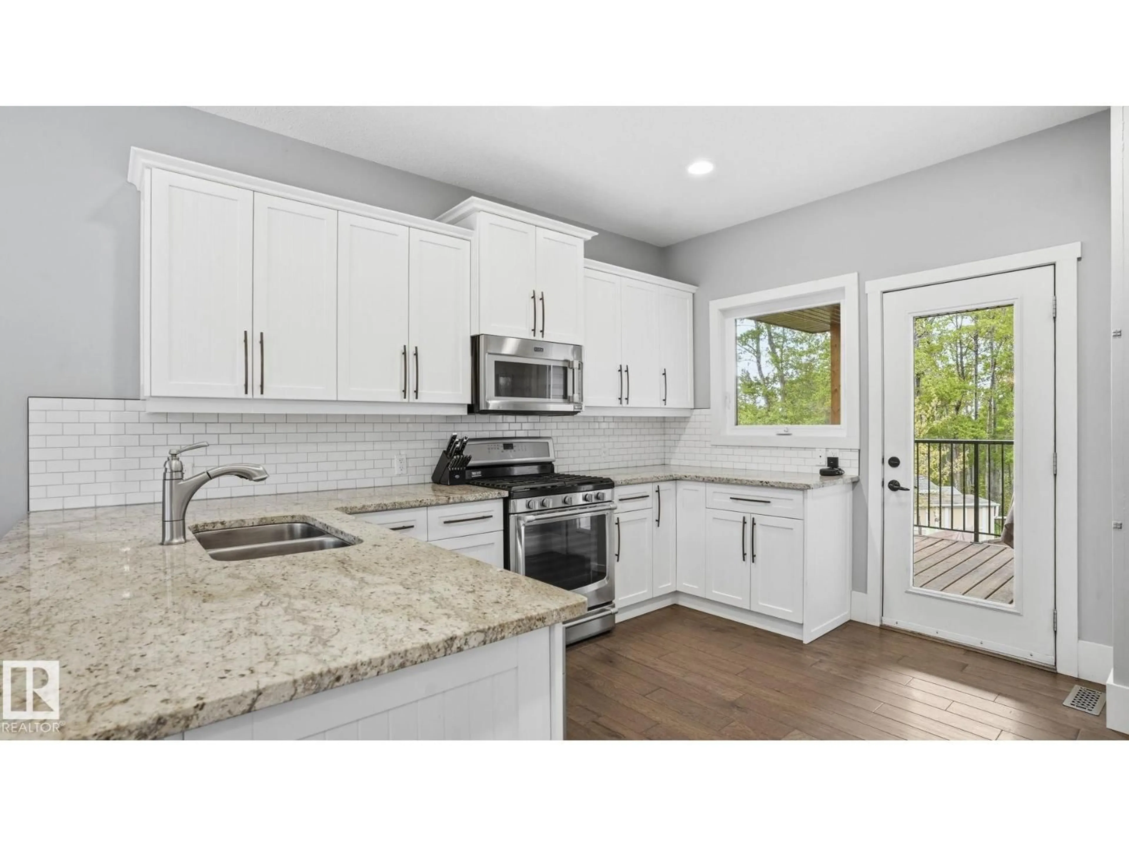 Open concept kitchen, ceramic/tile floor for 977 9TH ST, Rural Lac Ste. Anne County Alberta T0E1A0
