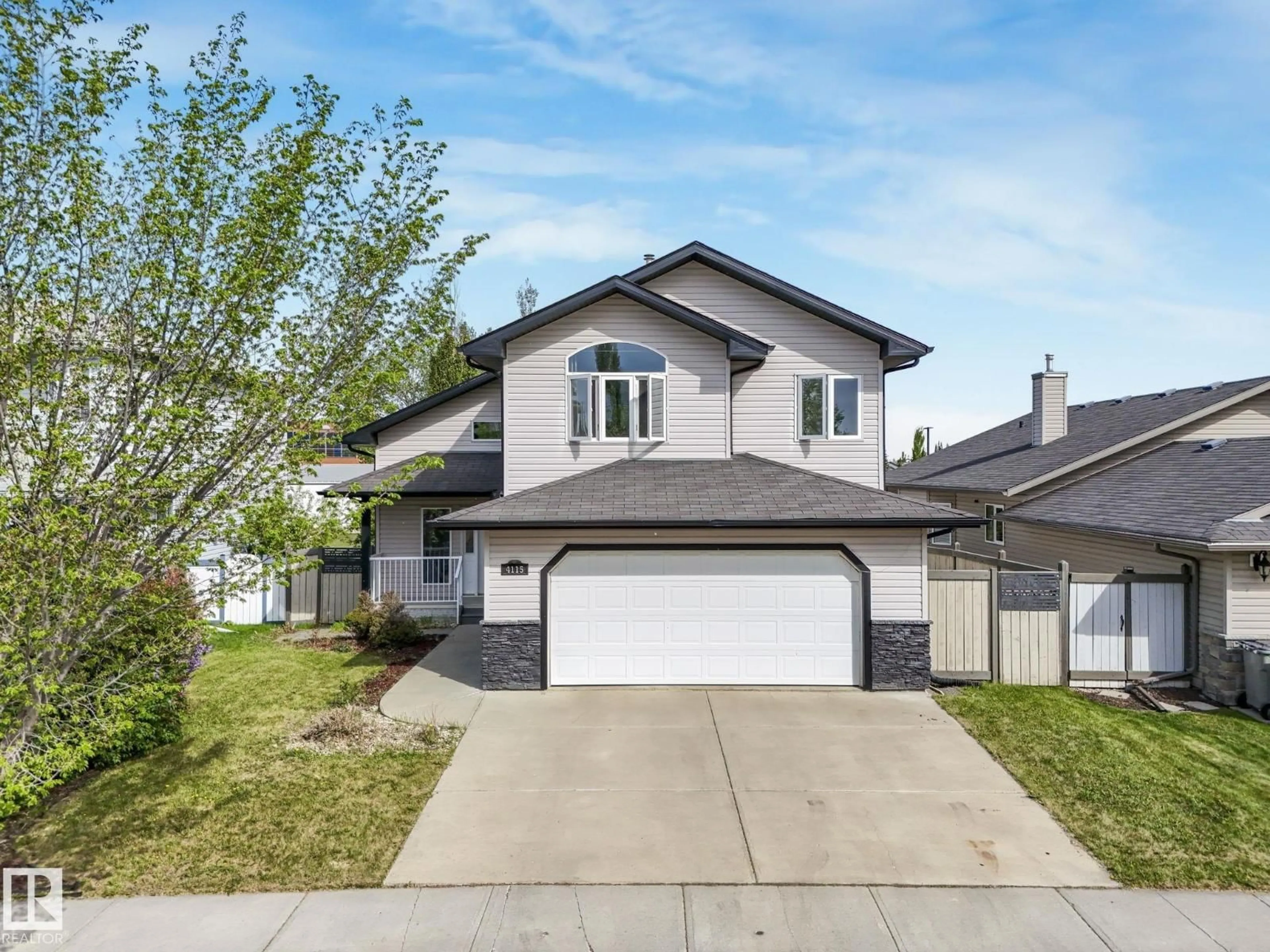 Home with vinyl exterior material, street for 4115 58 ST, Beaumont Alberta T4X1R7