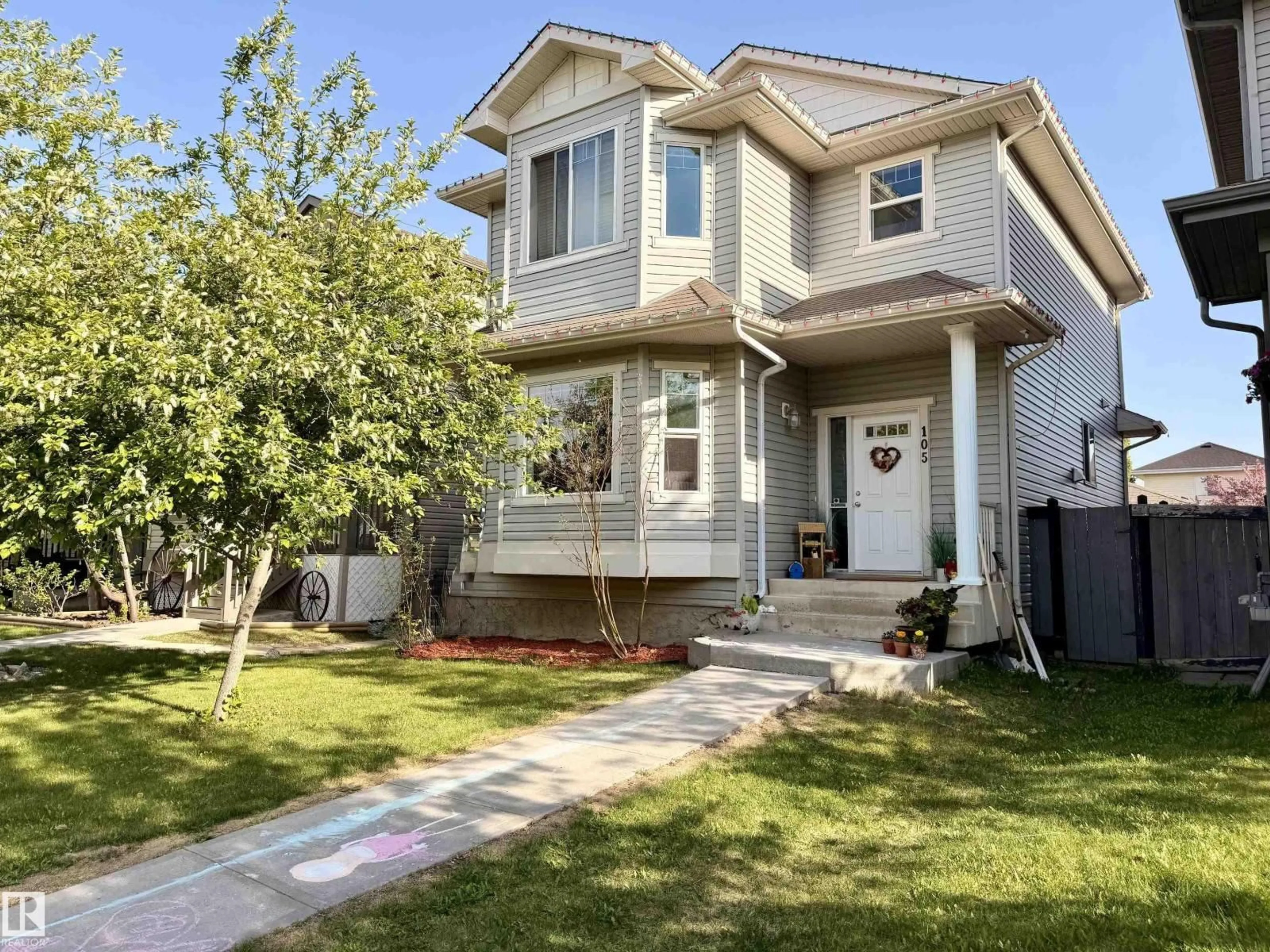 Home with vinyl exterior material, street for 105 KEYSTONE CR, Leduc Alberta T9E0J4