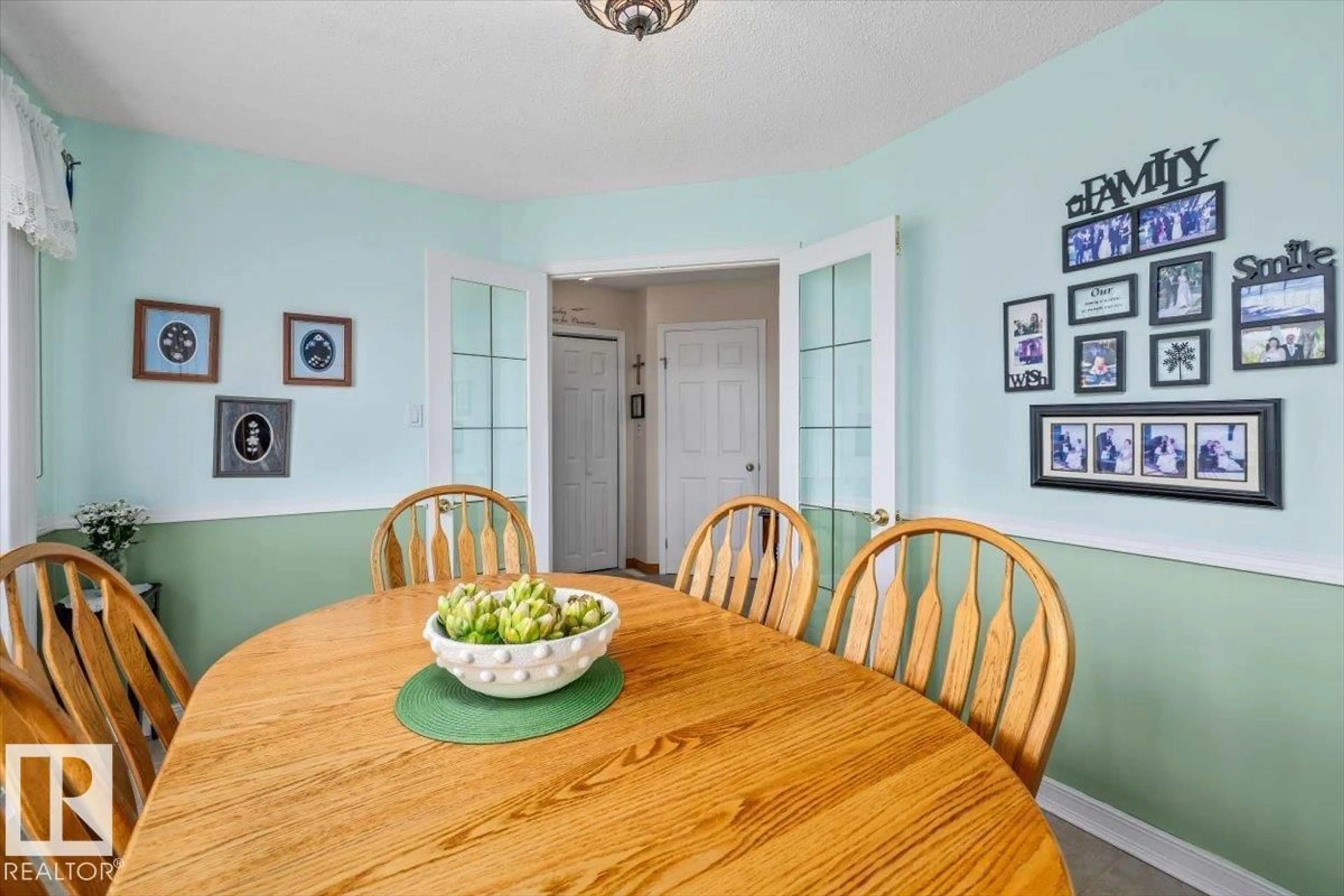 Dining room, wood/laminate floor for 9808 108 A, Fort Saskatchewan Alberta T8L4C7