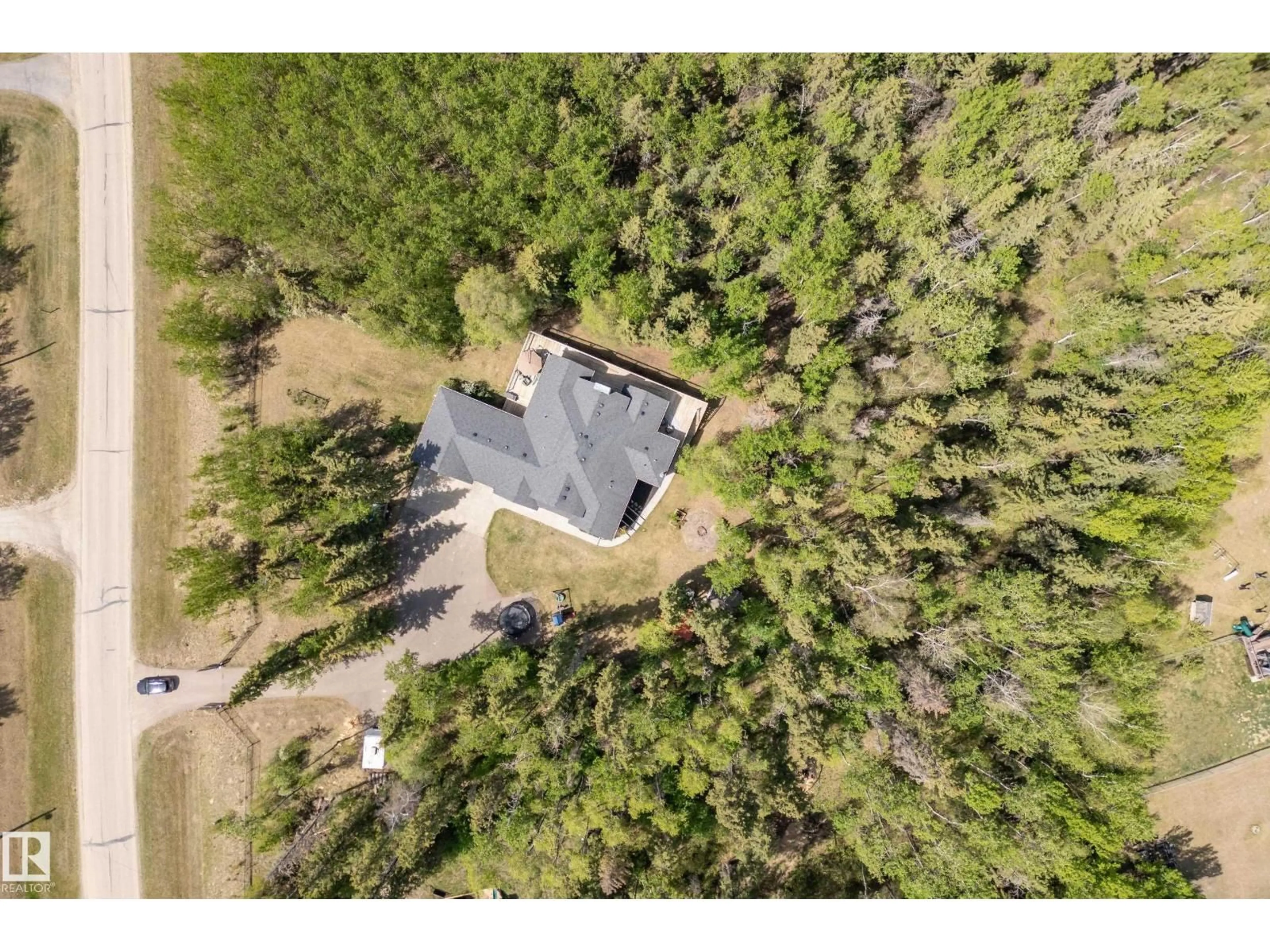 A pic from outside/outdoor area/front of a property/back of a property/a pic from drone, forest/trees view for 25 53024 RGE ROAD 15, Rural Parkland County Alberta T7Y2T4