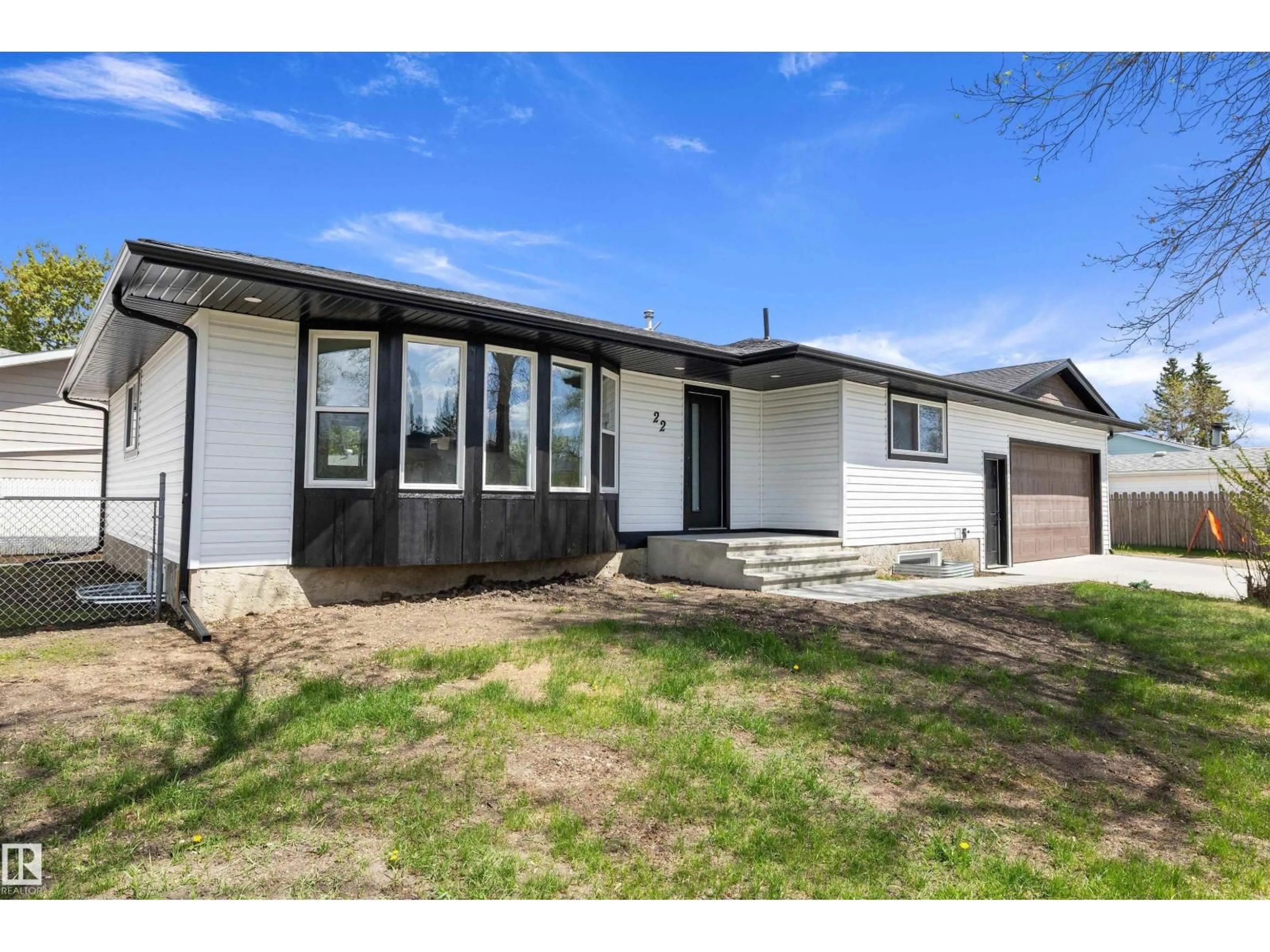 Home with vinyl exterior material, street for 22 HURON DR, Leduc Alberta T9E4N5