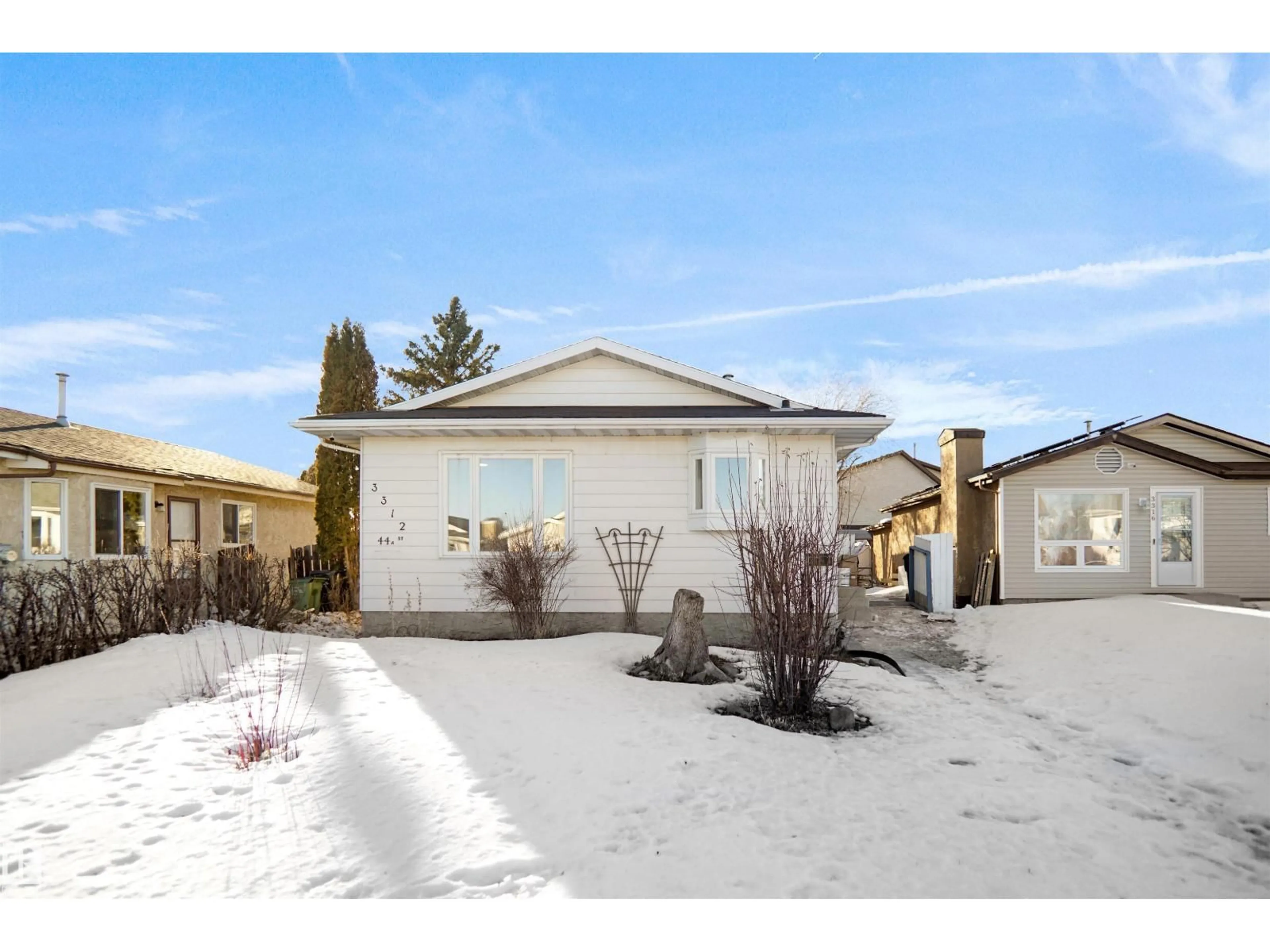 Home with vinyl exterior material, street for 3312 44A ST, Edmonton Alberta T6L4W9