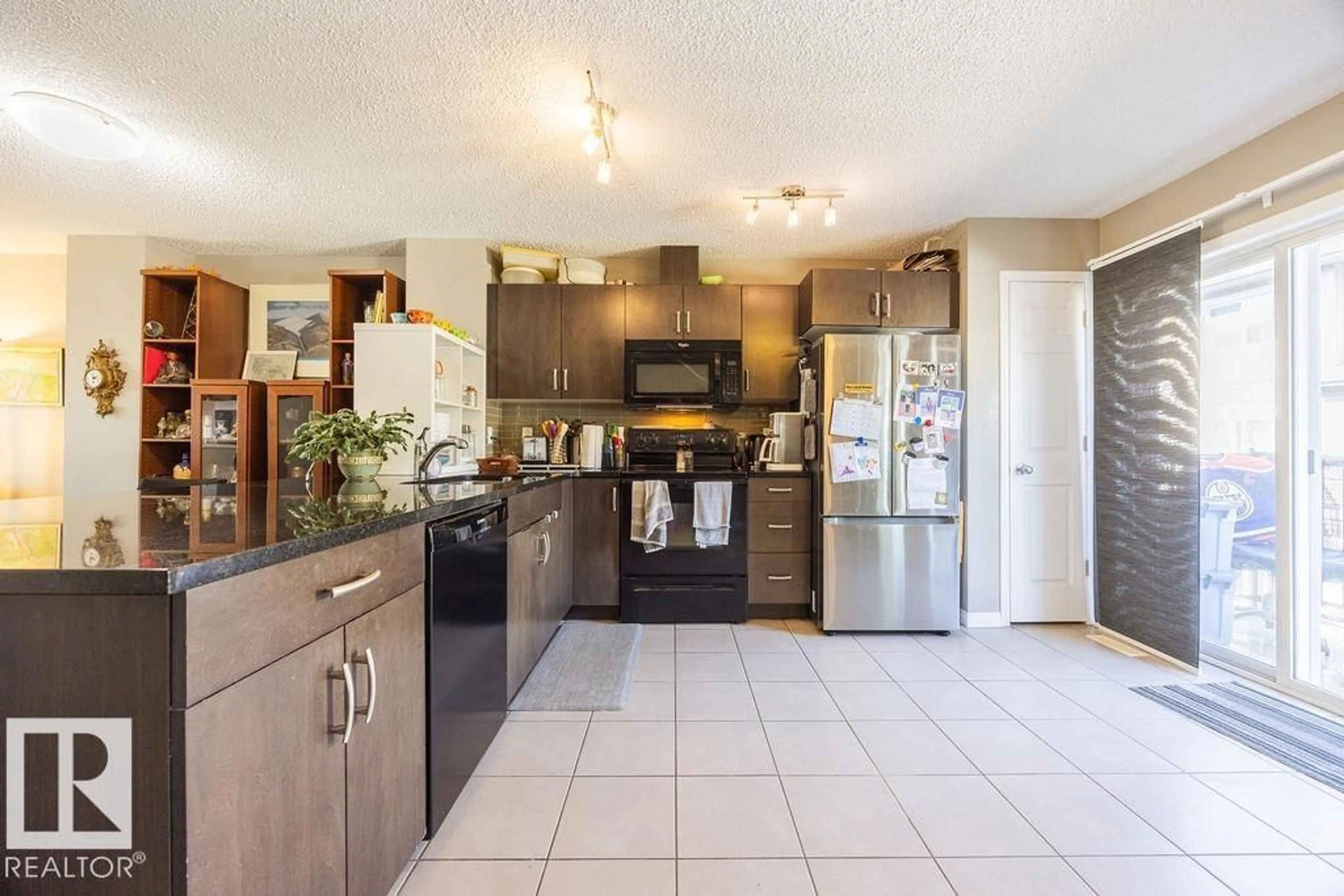 Open concept kitchen, ceramic/tile floor for 19 1030 CHAPPELLE BV SW, Edmonton Alberta T6W2K7