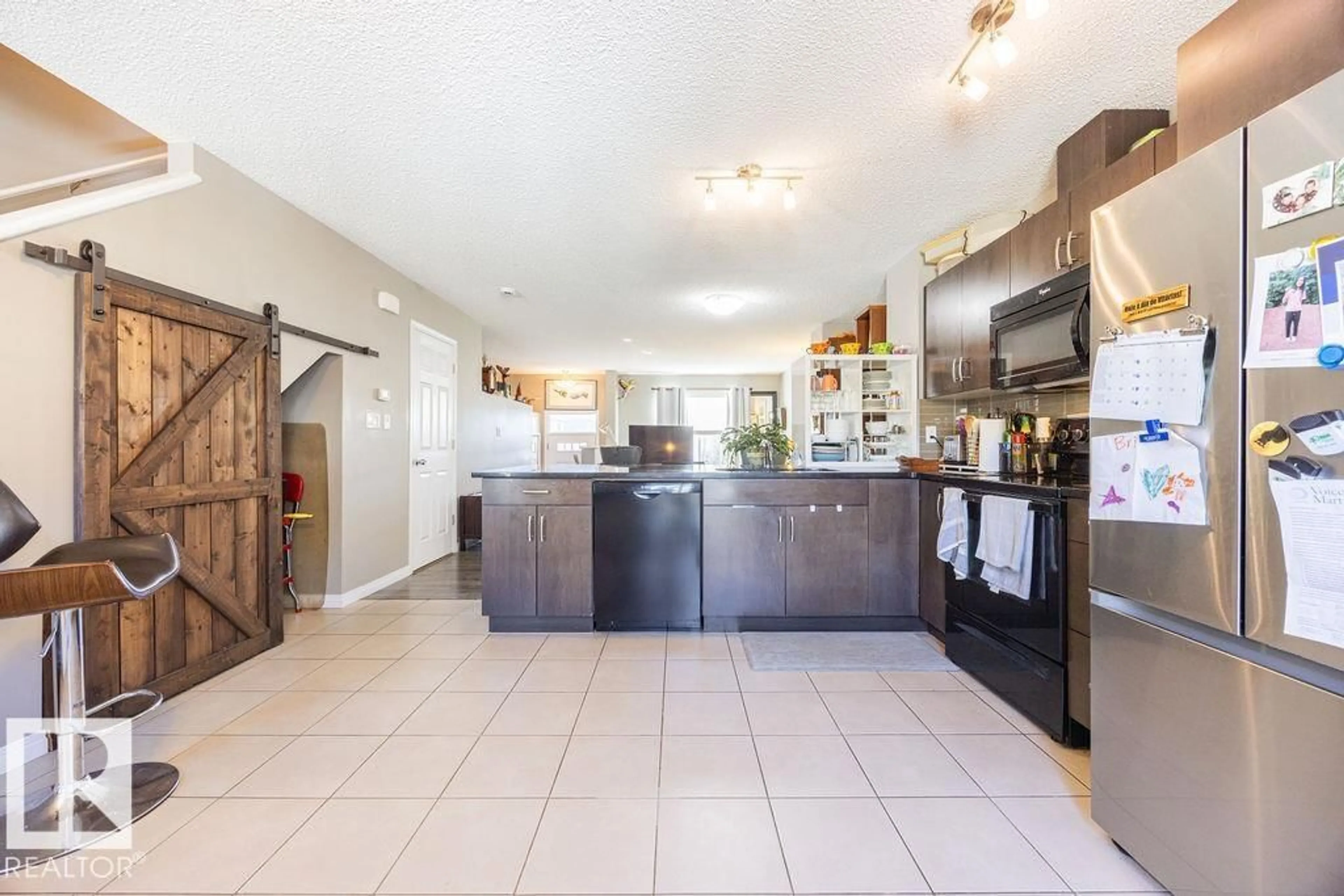 Open concept kitchen, ceramic/tile floor for 19 1030 CHAPPELLE BV SW, Edmonton Alberta T6W2K7