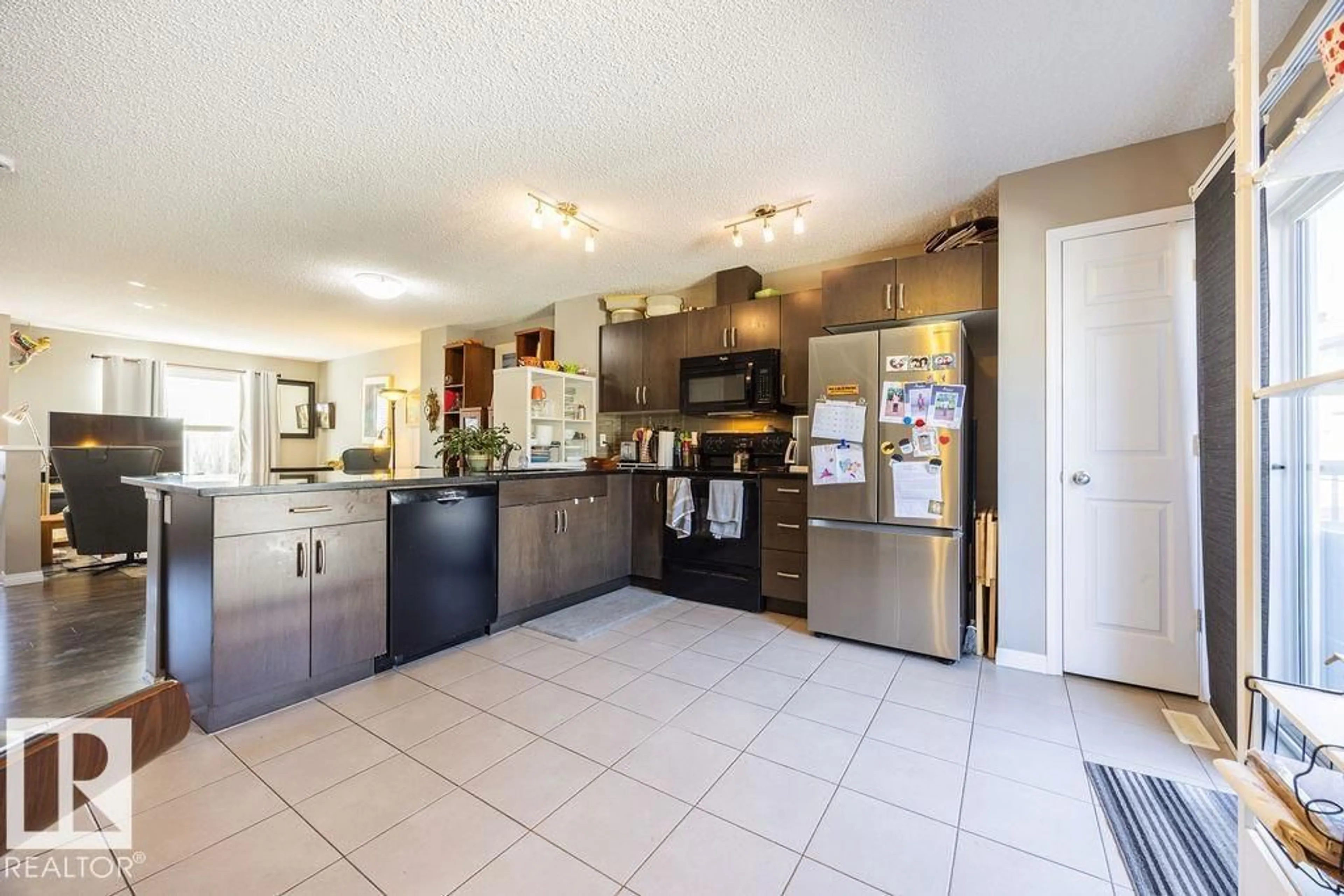 Open concept kitchen, ceramic/tile floor for 19 1030 CHAPPELLE BV SW, Edmonton Alberta T6W2K7