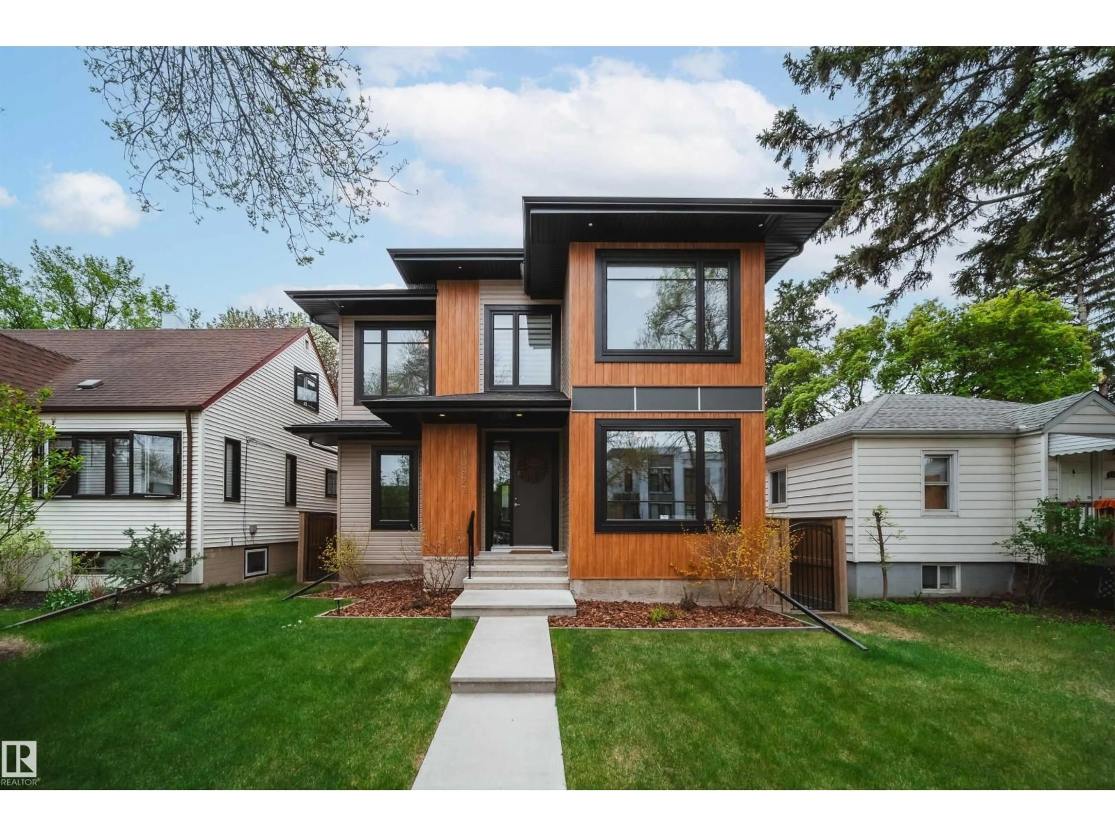 Home with brick exterior material, street for NW - 10823 67 AV, Edmonton Alberta T6H2A2