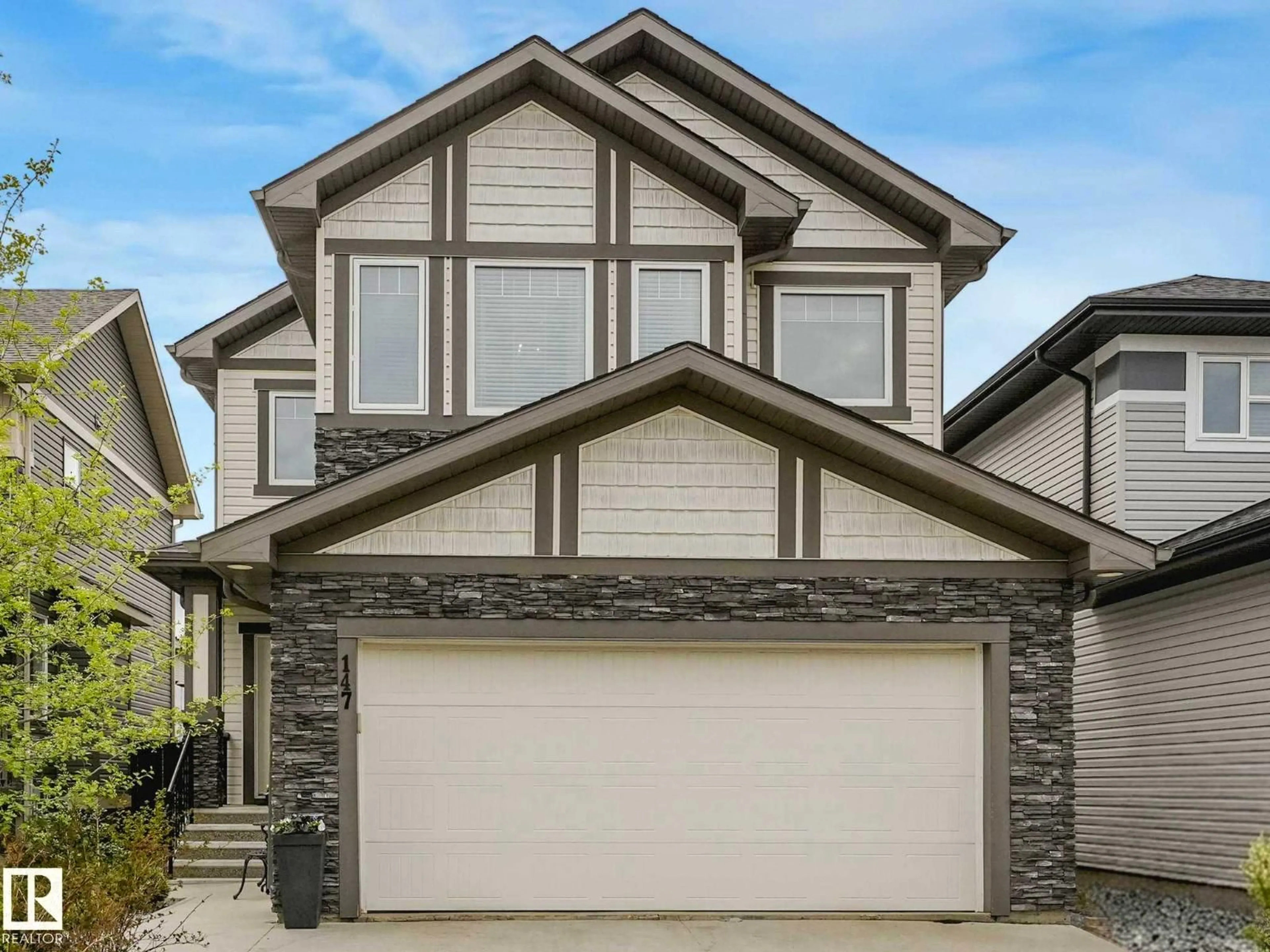 Home with vinyl exterior material, street for 147 HARVEST RIDGE DR, Spruce Grove Alberta T7X0P4
