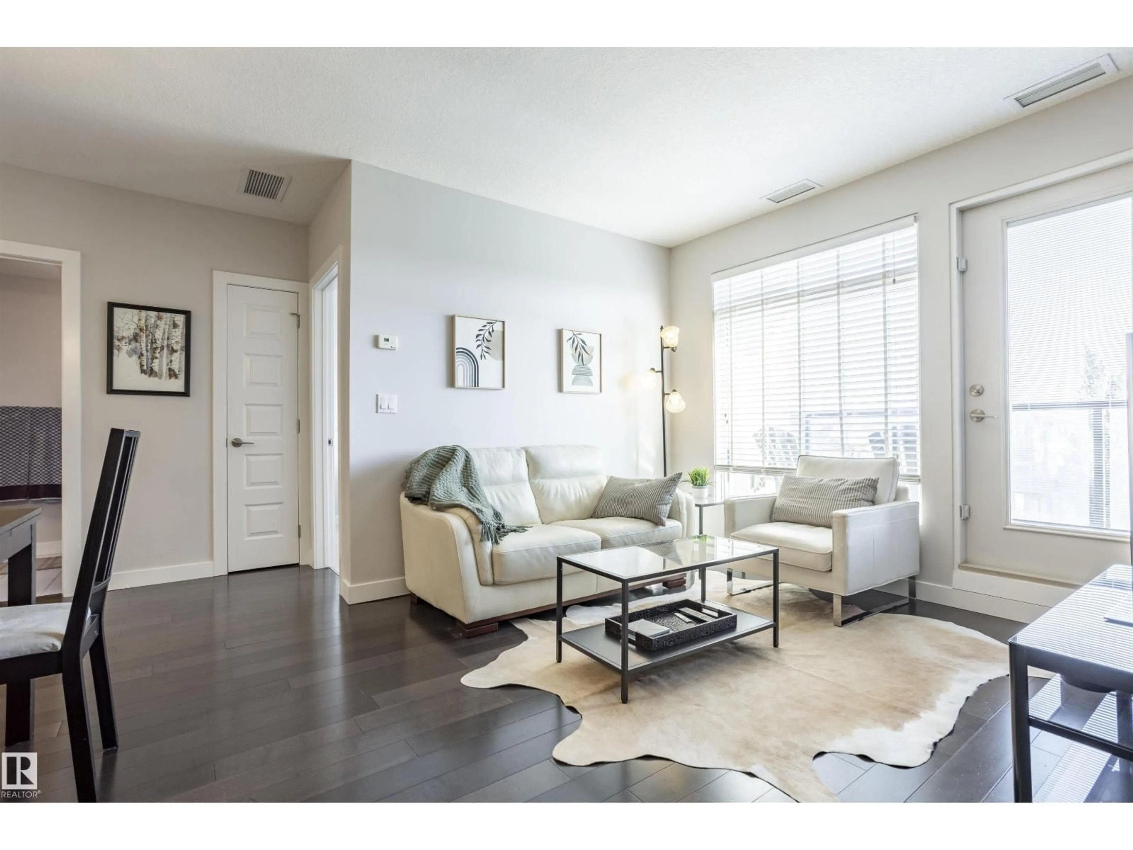 Living room with furniture, unknown for #307 - 5151 WINDERMERE BV, Edmonton Alberta T6W2K4