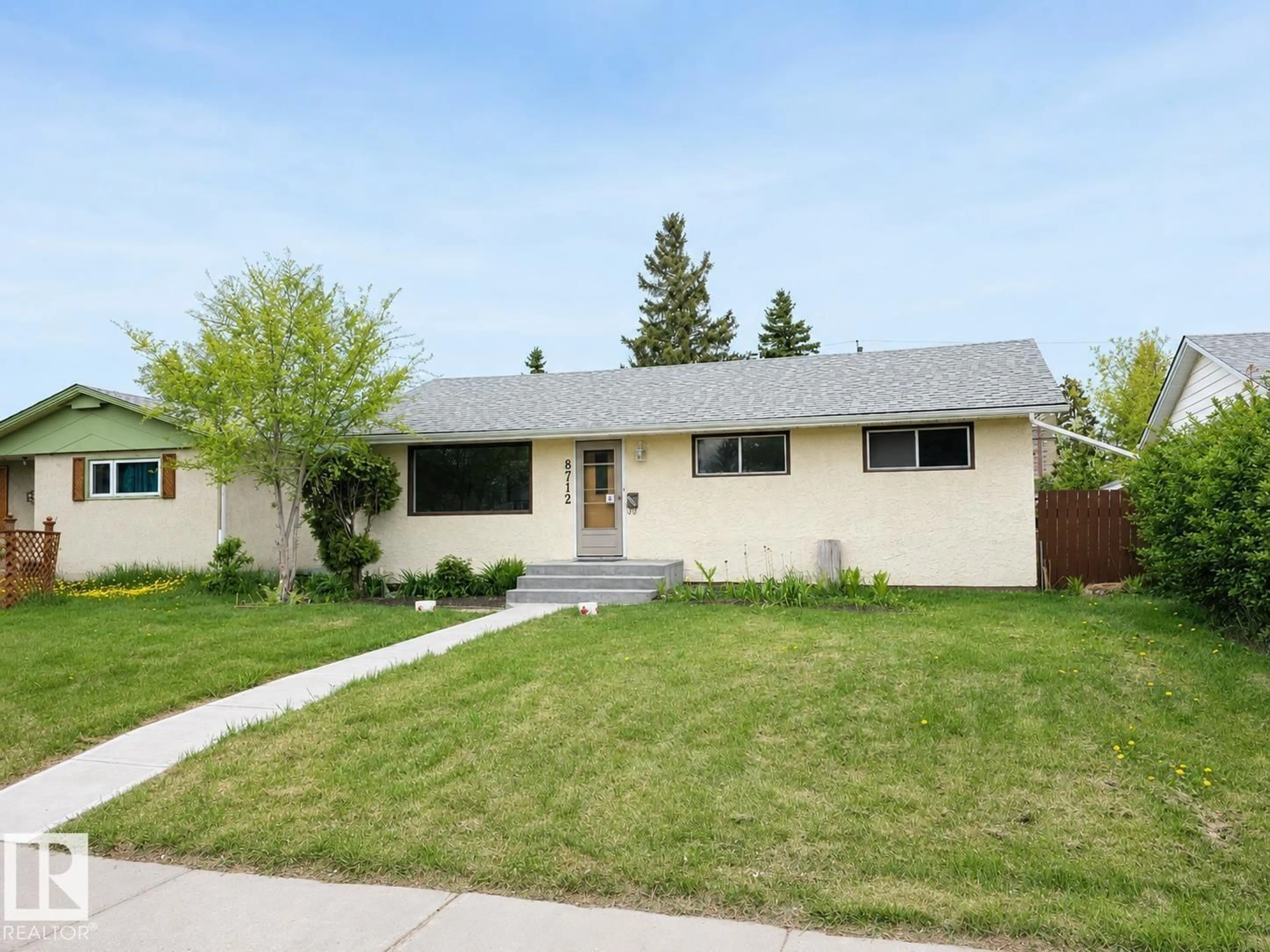 Home with vinyl exterior material, street for NW - 8712 162 ST, Edmonton Alberta T5R2M1