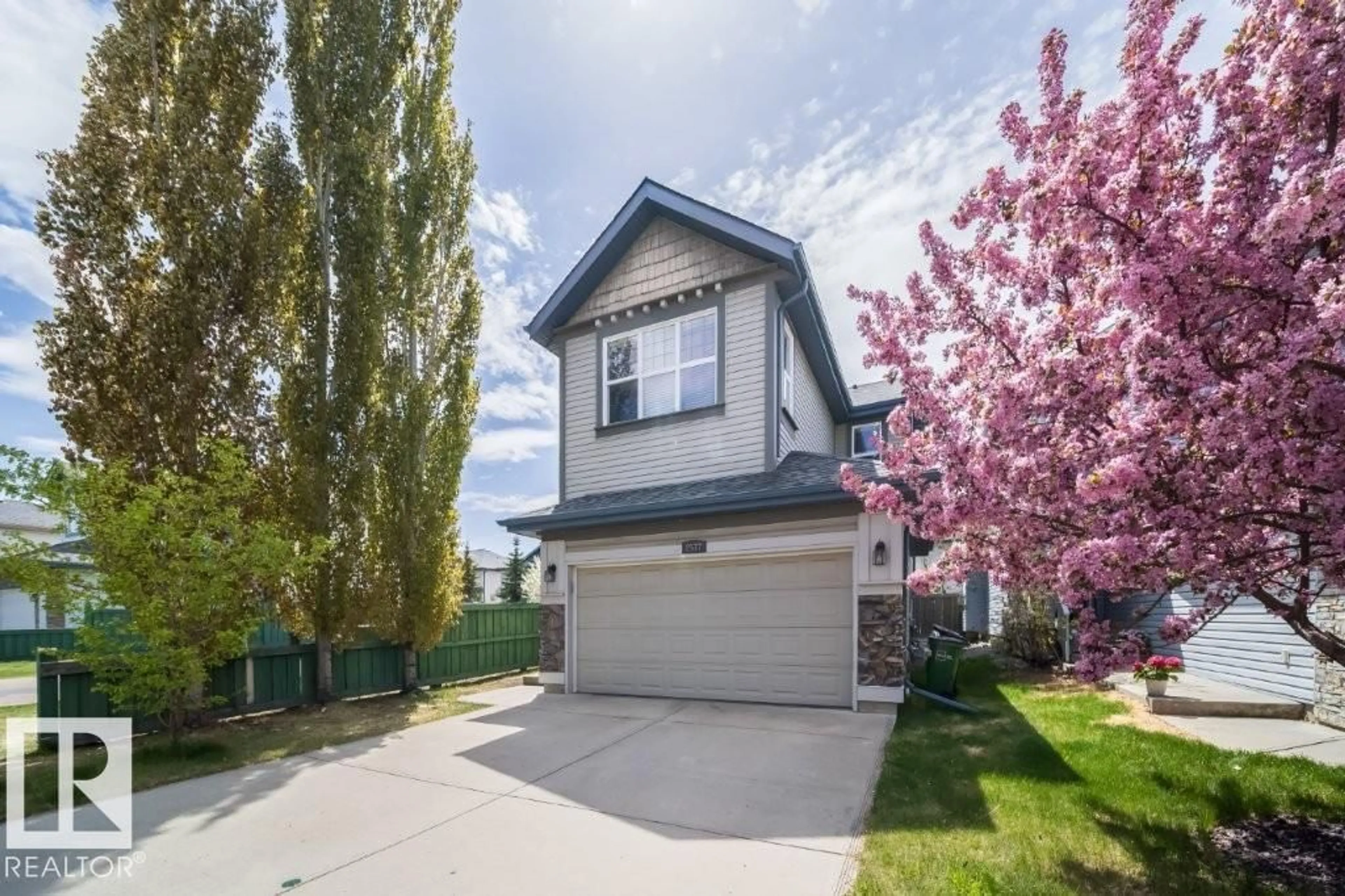 Home with vinyl exterior material, street for 2577 HANNA CR, Edmonton Alberta T6R3P7