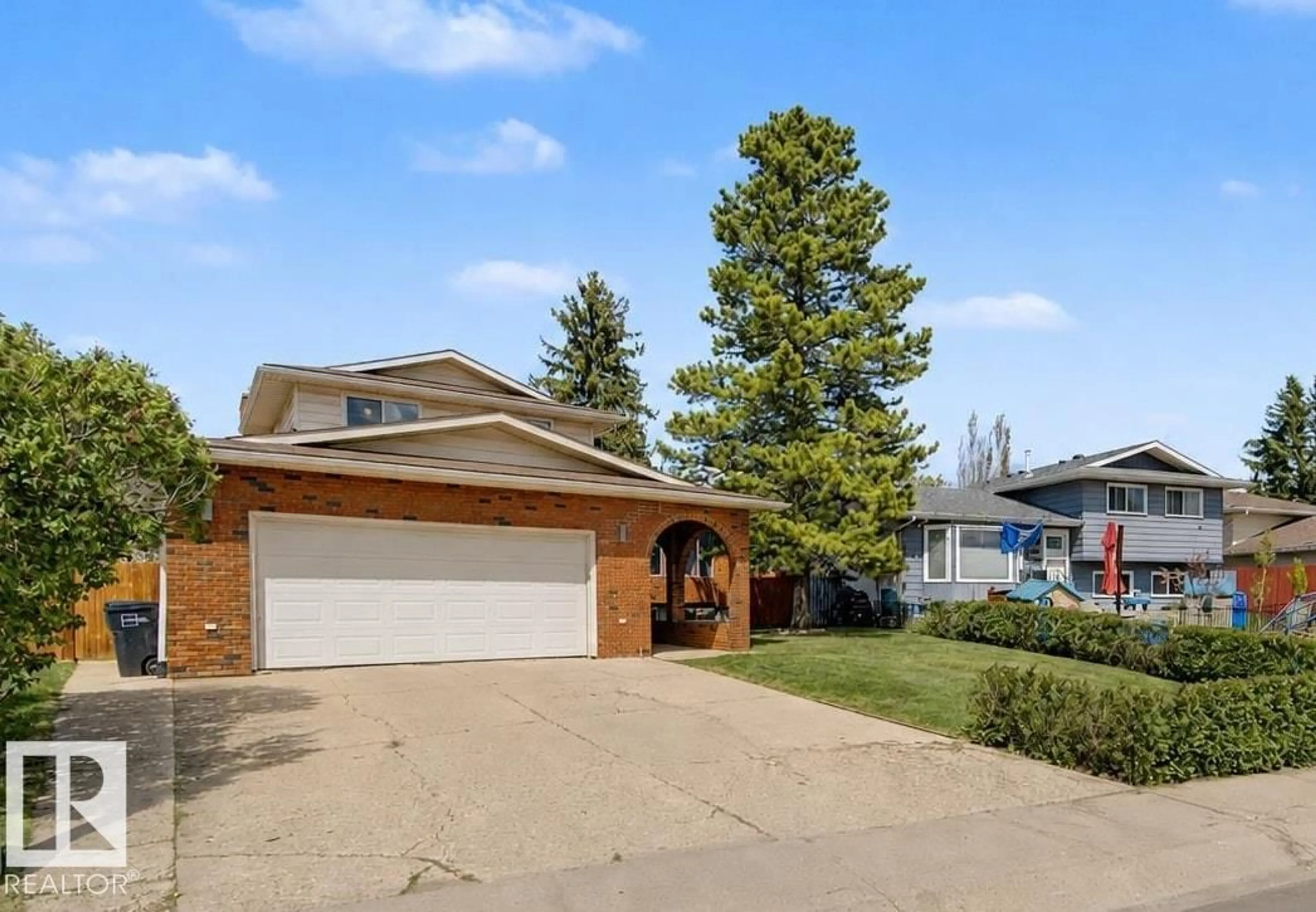Home with brick exterior material, street for NW - 2068 45 ST, Edmonton Alberta T6L2V1