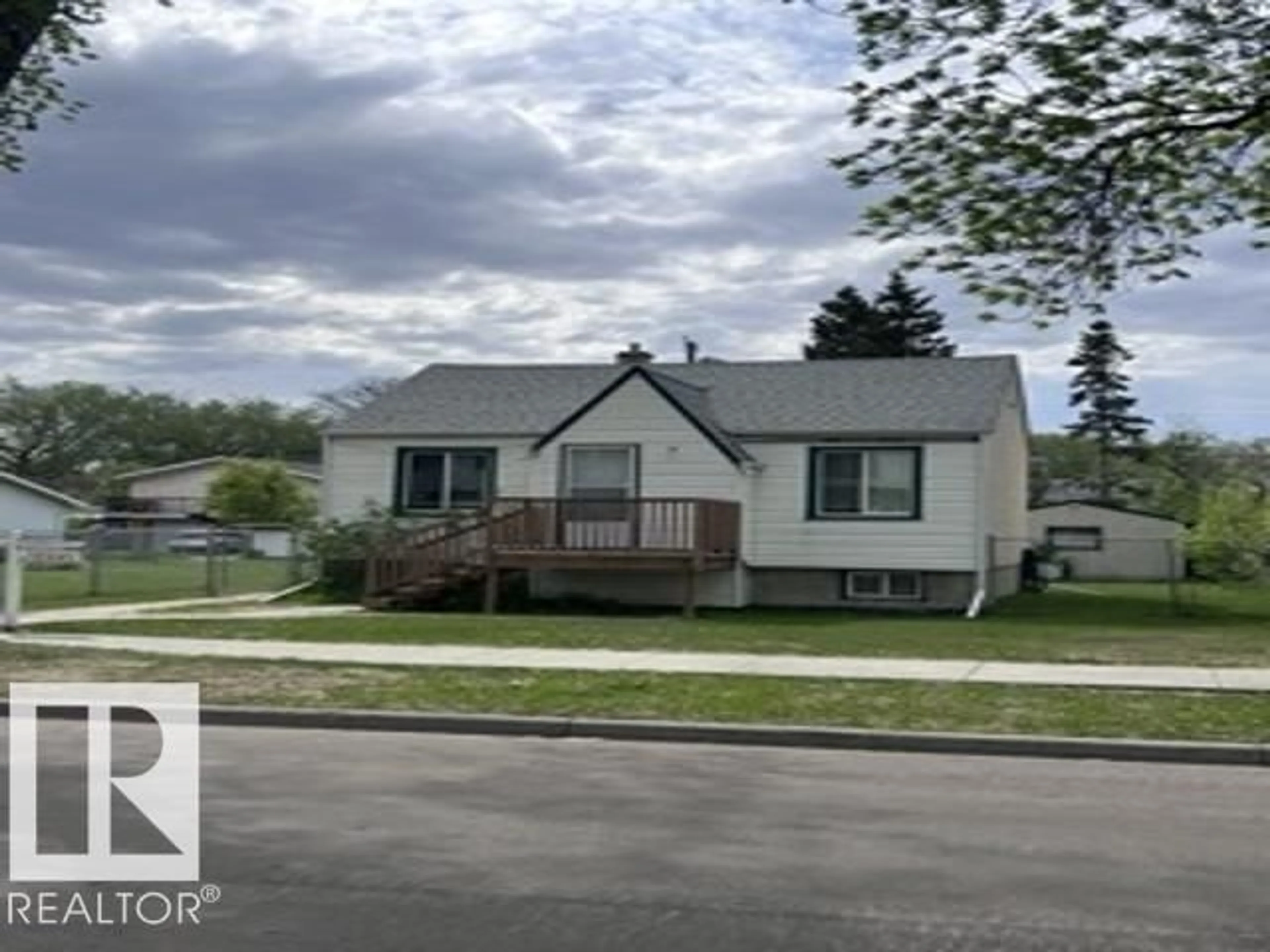 Home with vinyl exterior material, street for NW - 12242 91 ST, Edmonton Alberta T5B4C3