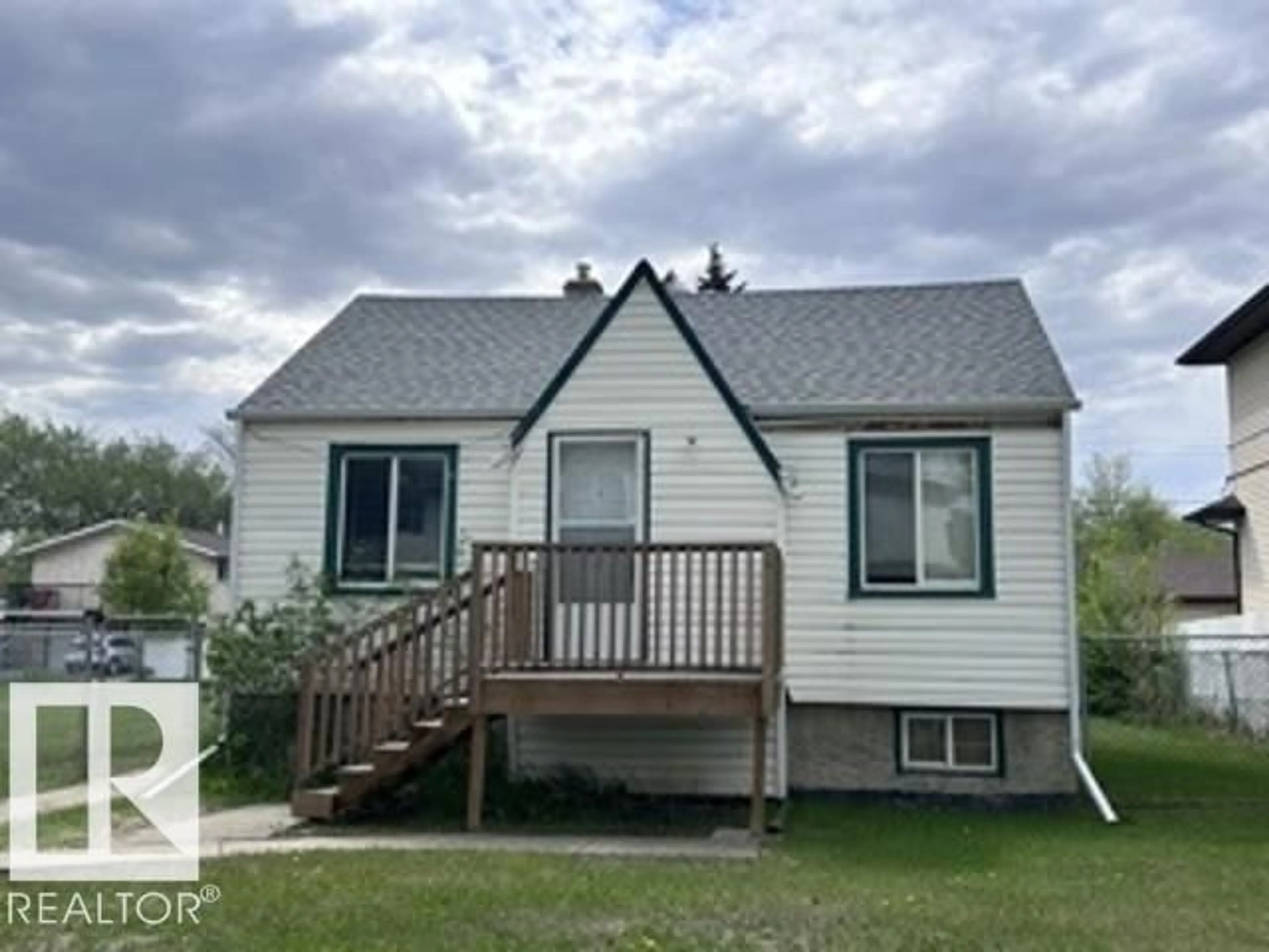 Home with vinyl exterior material, street for NW - 12242 91 ST, Edmonton Alberta T5B4C3