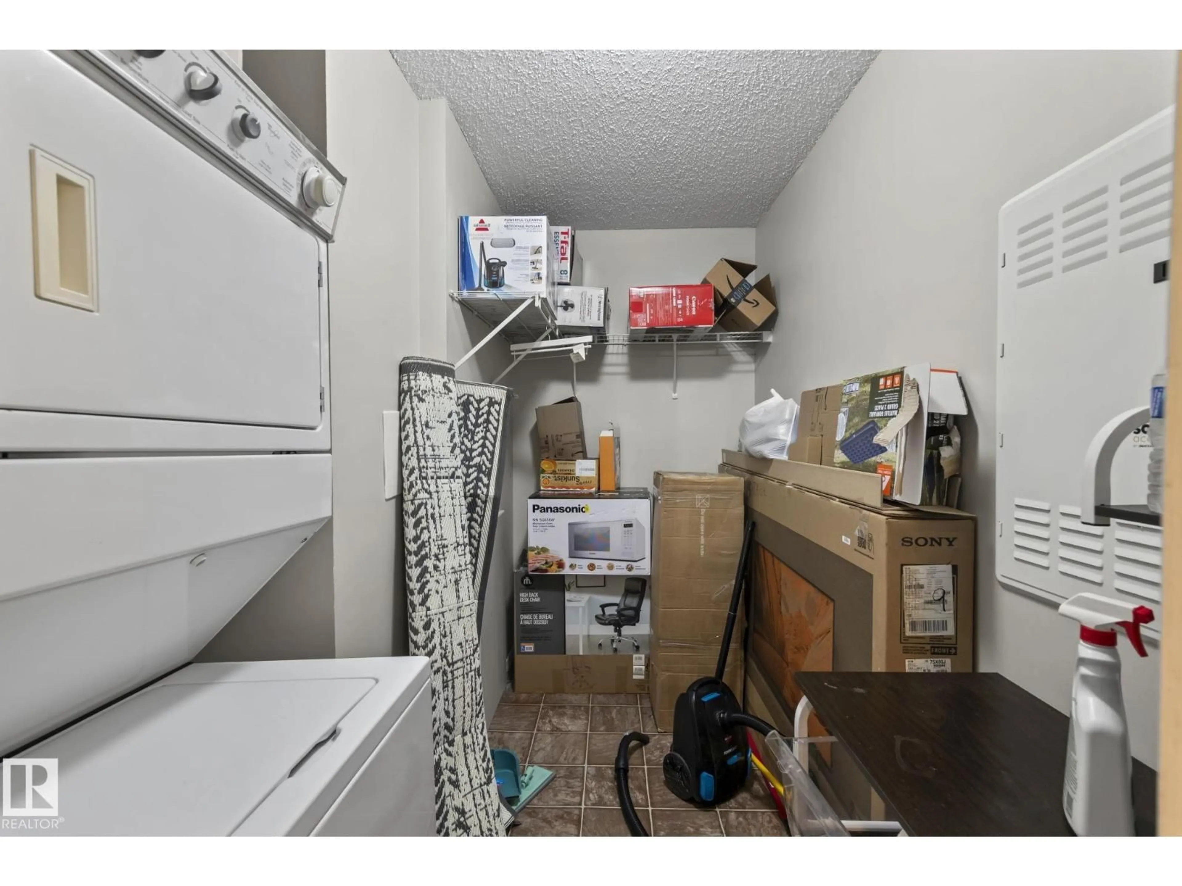 Storage room or clothes room or walk-in closet for 9357 - 2106 SIMPSON DR, Edmonton Alberta T6R0N3