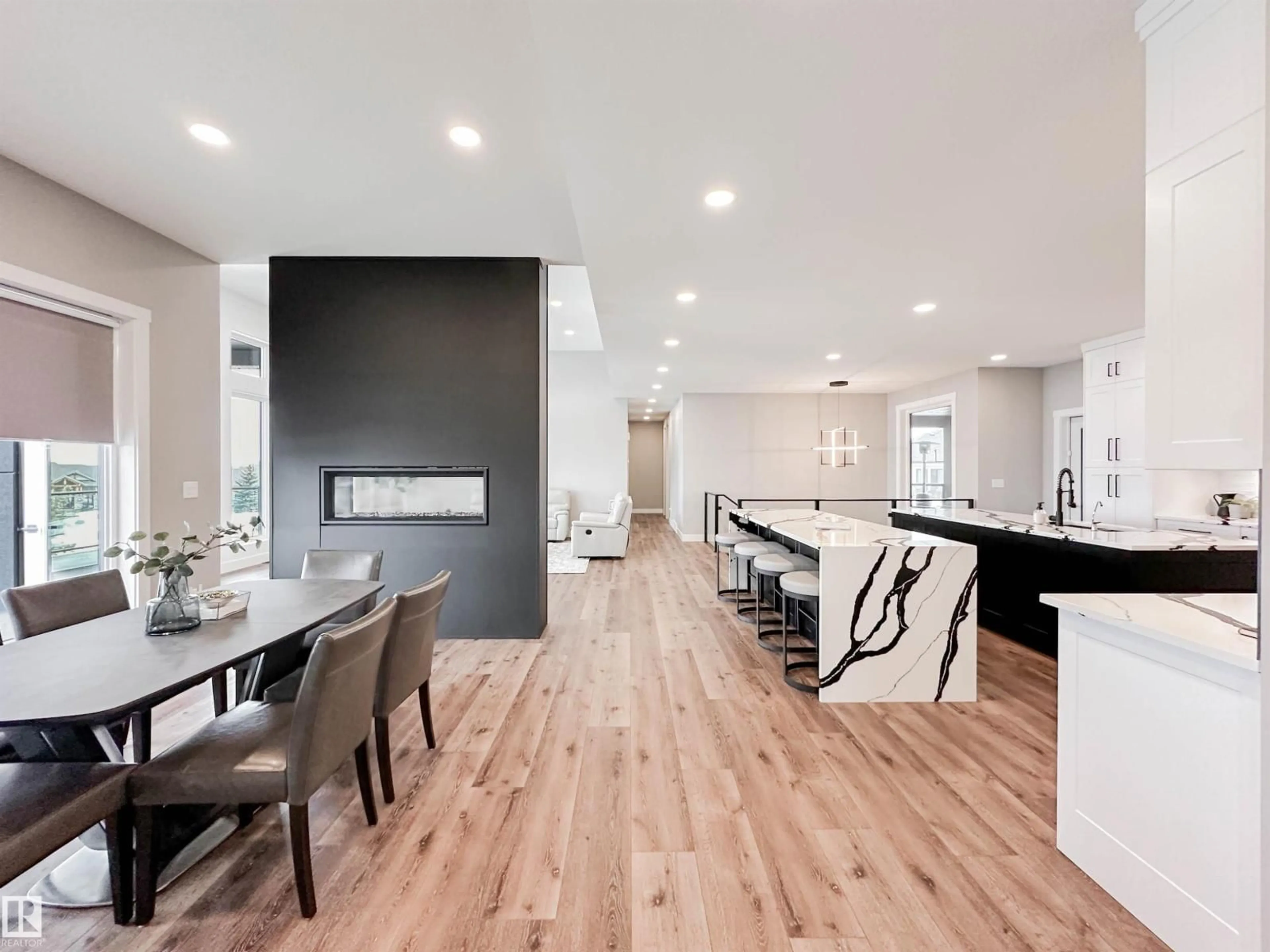 Open concept kitchen, wood/laminate floor for 24 27320 TWP ROAD 534, Rural Parkland County Alberta T7X3R9