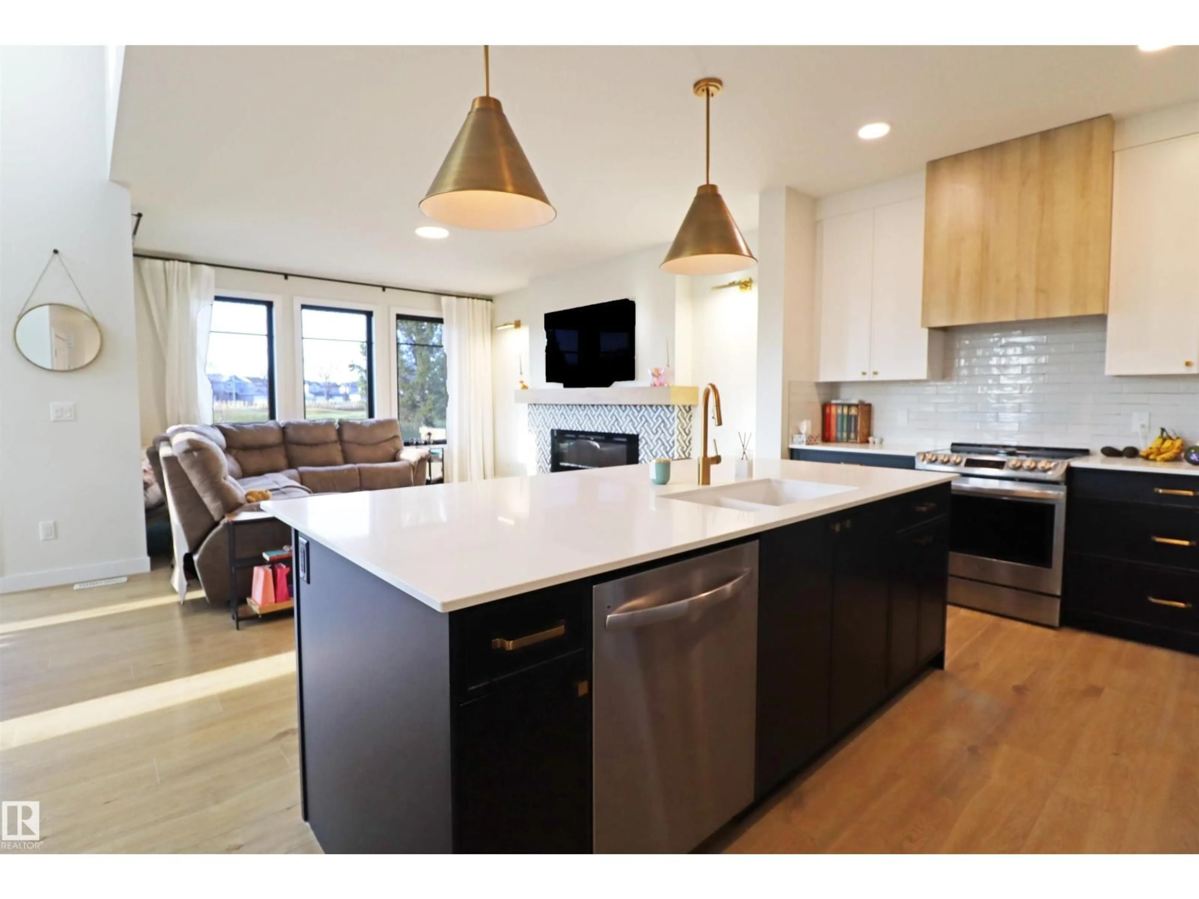 Open concept kitchen, wood/laminate floor for 100 GRAYBRIAR DR, Stony Plain Alberta T7Z0M7