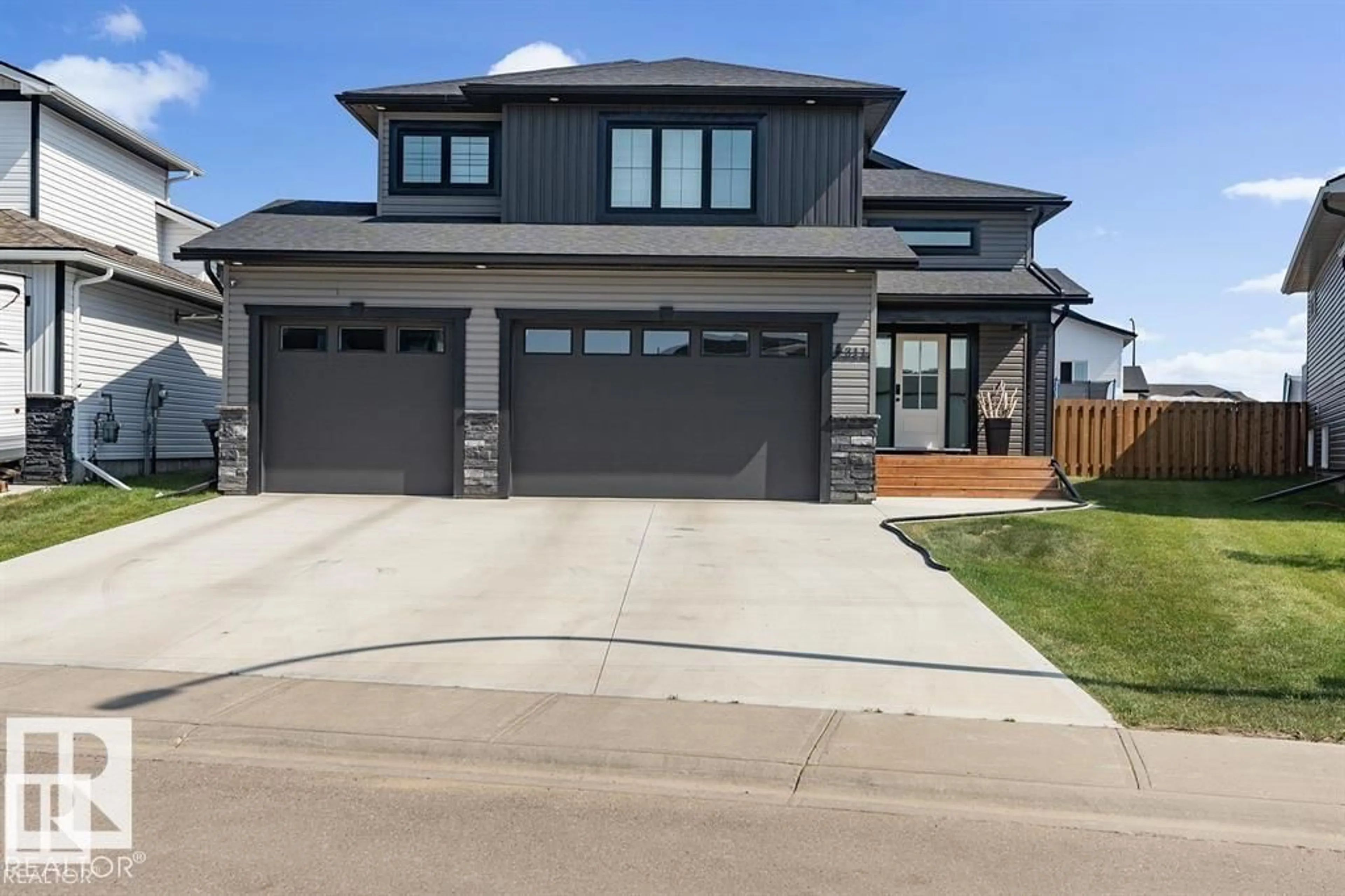 Home with brick exterior material, street for 303 FUNDY WY, Cold Lake Alberta T9M0M4