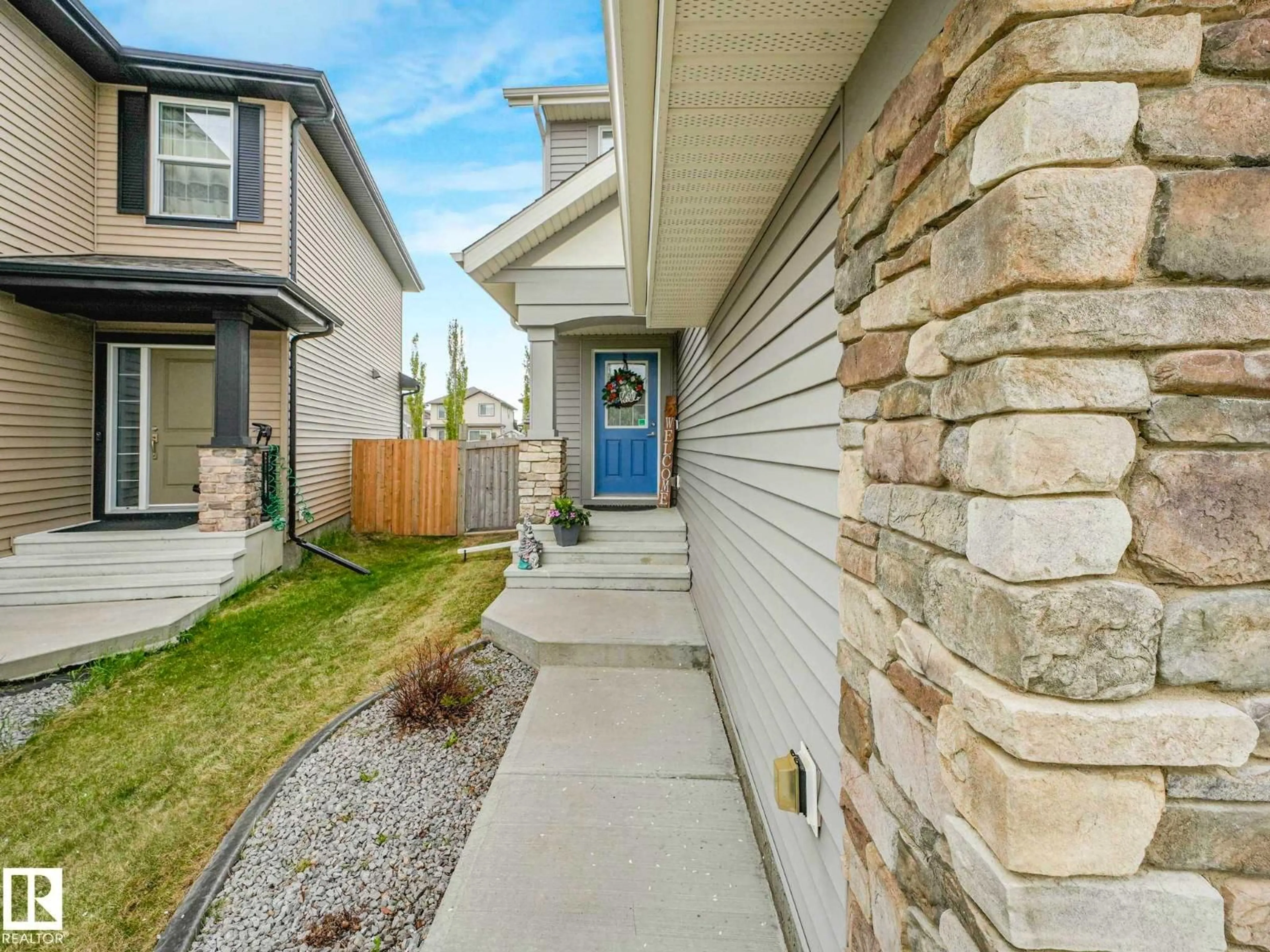 Home with vinyl exterior material, street for 13755 166 AV, Edmonton Alberta T6V0H5