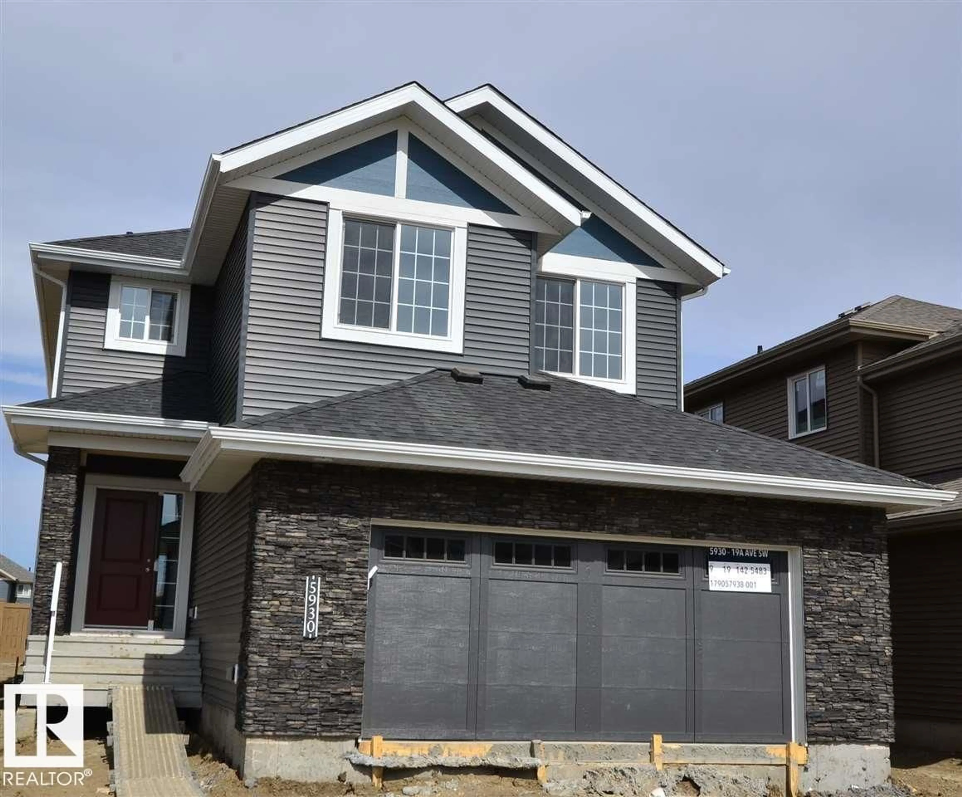 Home with vinyl exterior material, street for 5930 19A AV, Edmonton Alberta T6X2A2