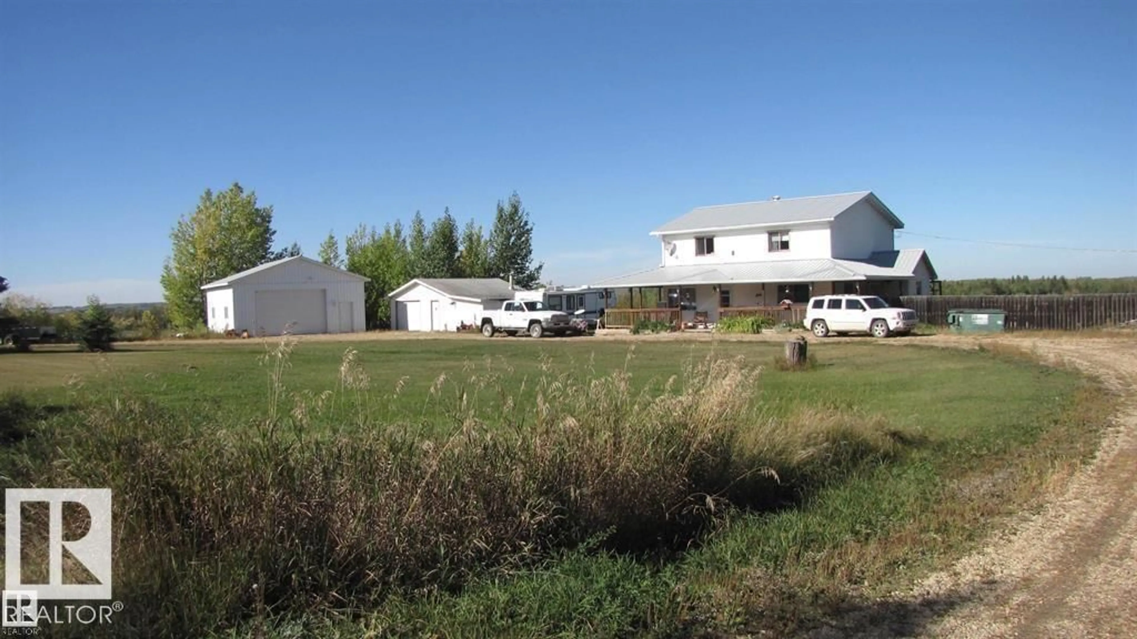 A pic from outside/outdoor area/front of a property/back of a property/a pic from drone, unknown for 6304 TWP ROAD 565 A, Rural Lac Ste. Anne County Alberta T0E2A0
