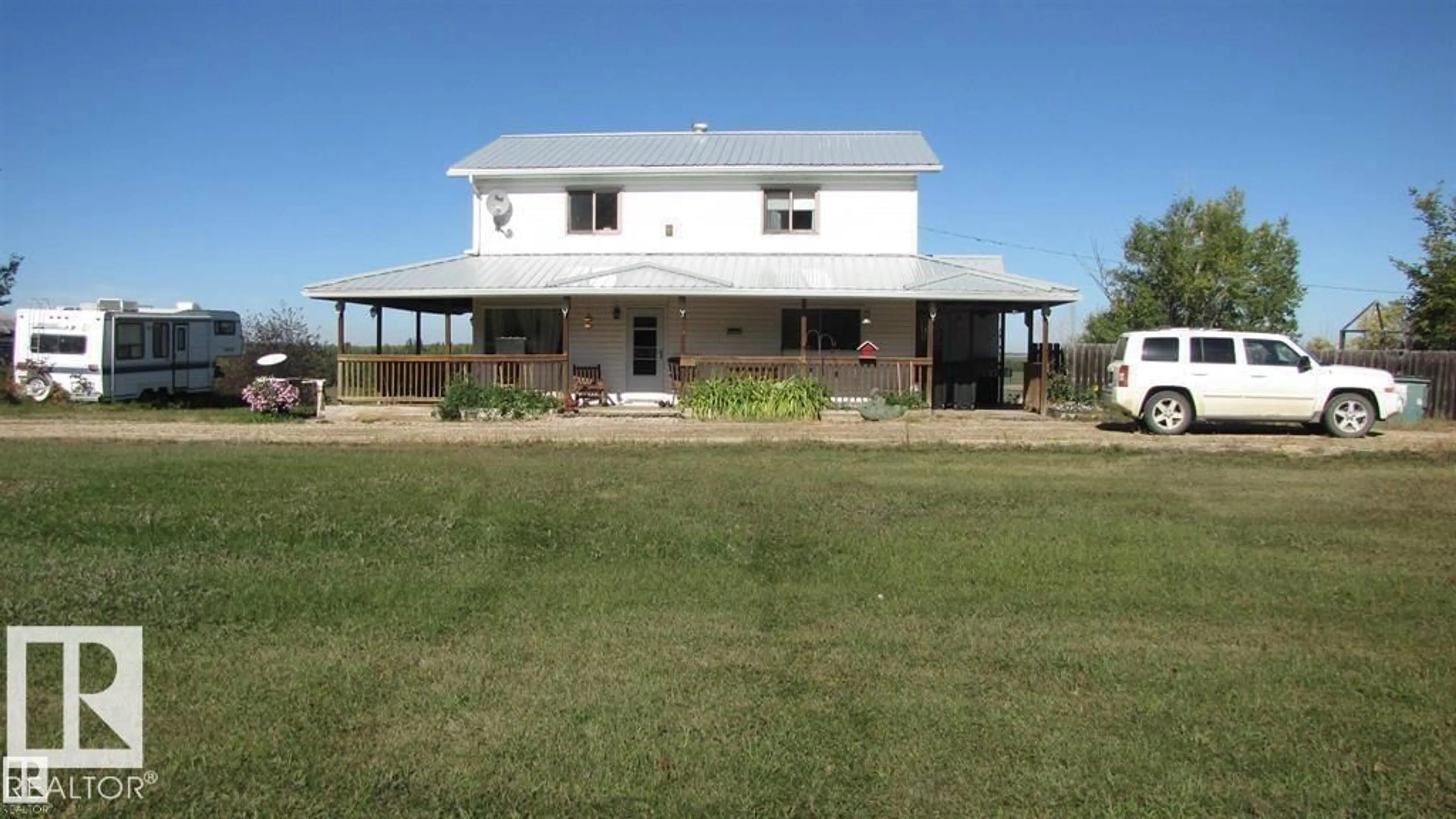 A pic from outside/outdoor area/front of a property/back of a property/a pic from drone, building for 6304 TWP ROAD 565 A, Rural Lac Ste. Anne County Alberta T0E2A0
