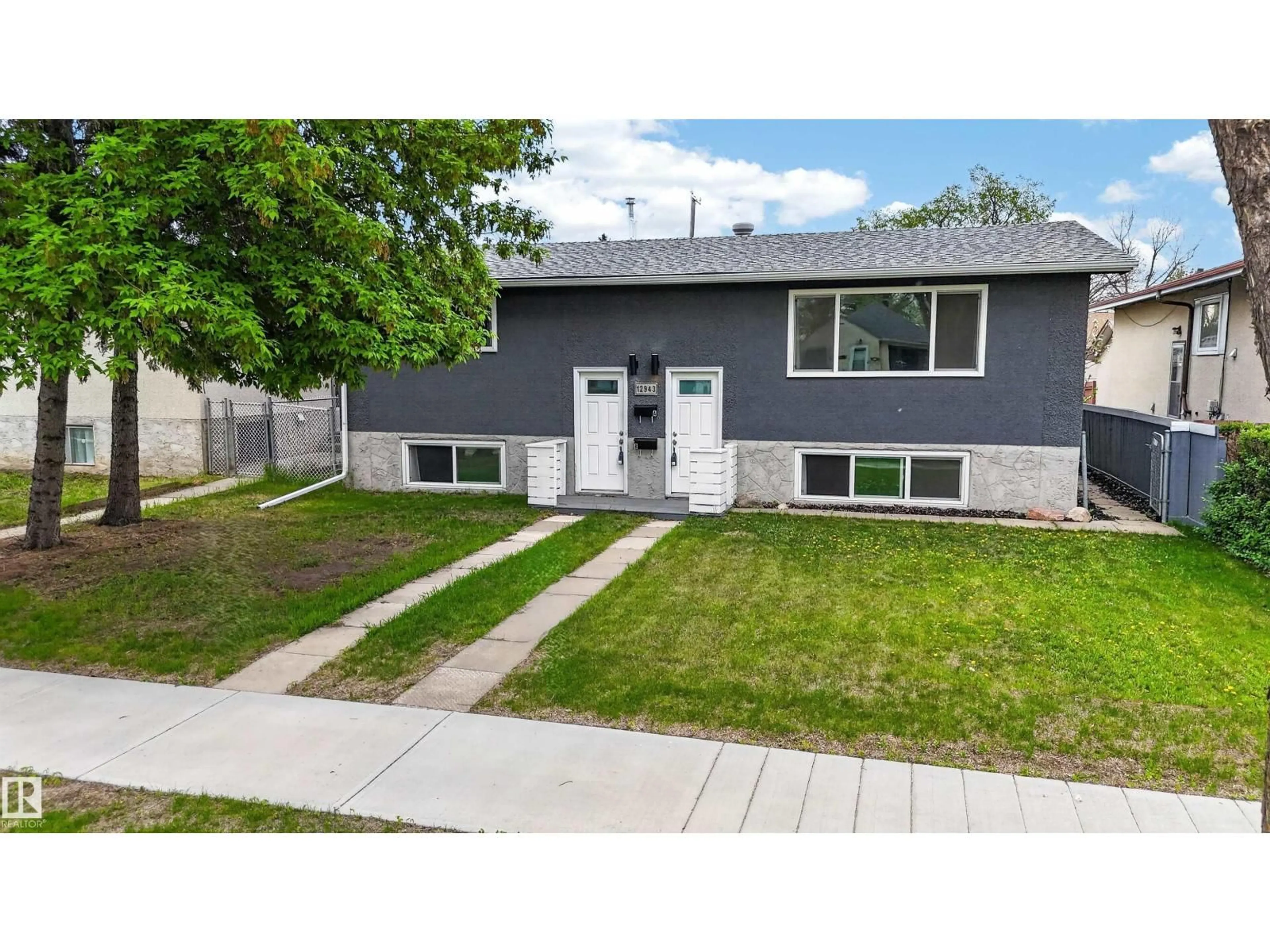 Home with vinyl exterior material, street for NW - 12943 123 ST, Edmonton Alberta T5L0J6