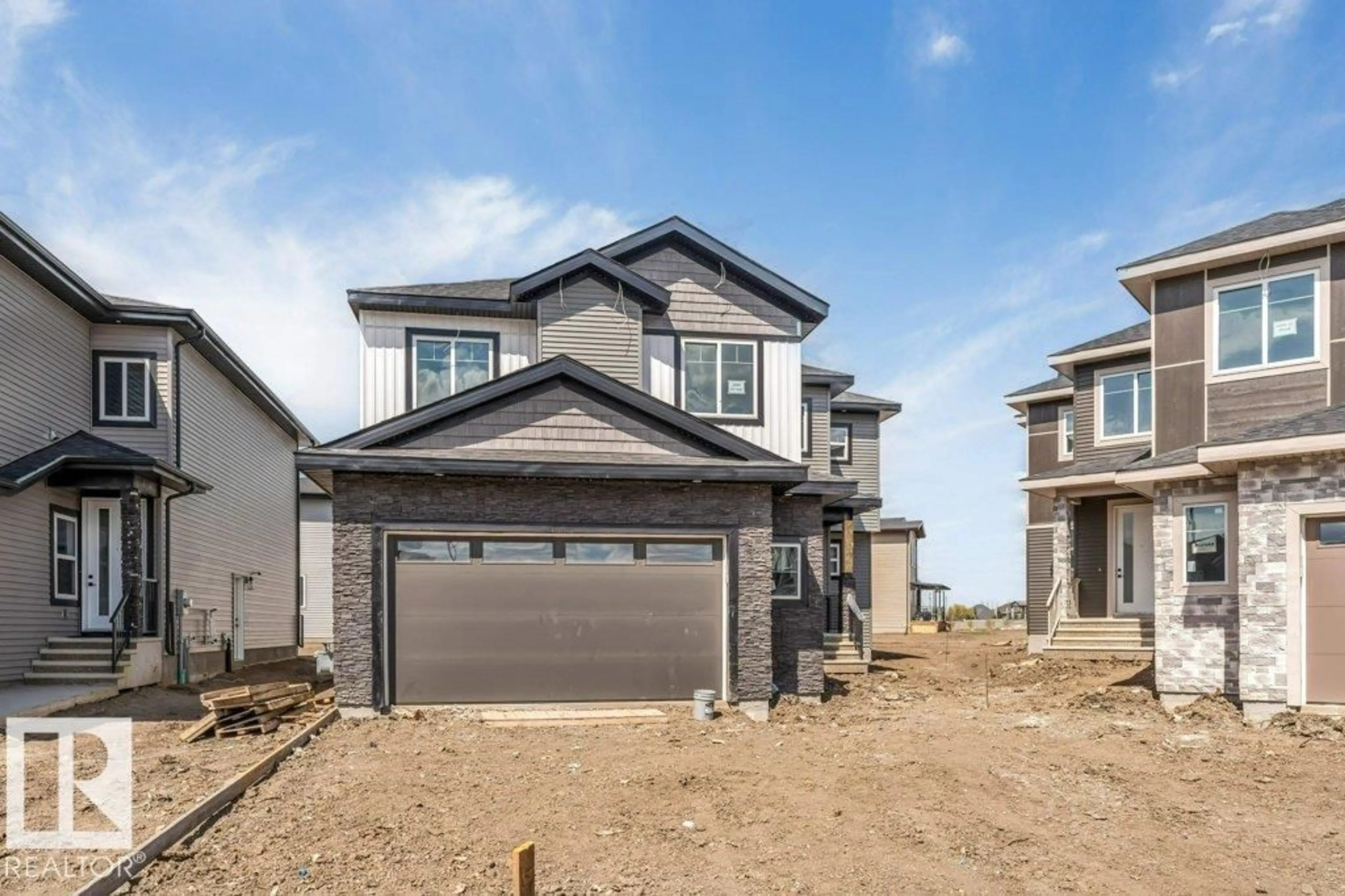 Home with vinyl exterior material, street for NE - 1848 62 AV, Rural Leduc County Alberta T4X3C8