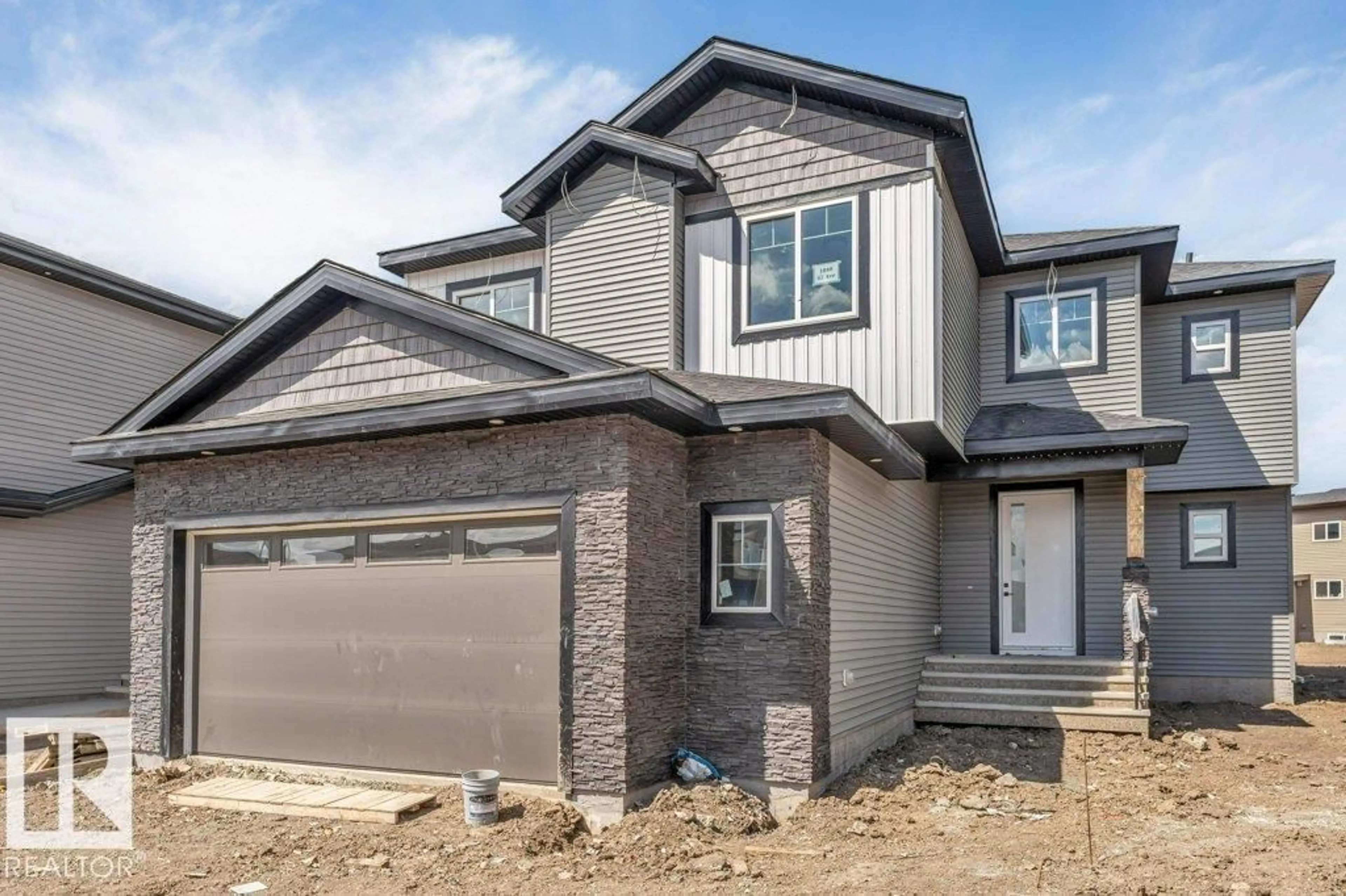 Home with brick exterior material, street for NE - 1848 62 AV, Rural Leduc County Alberta T4X3C8
